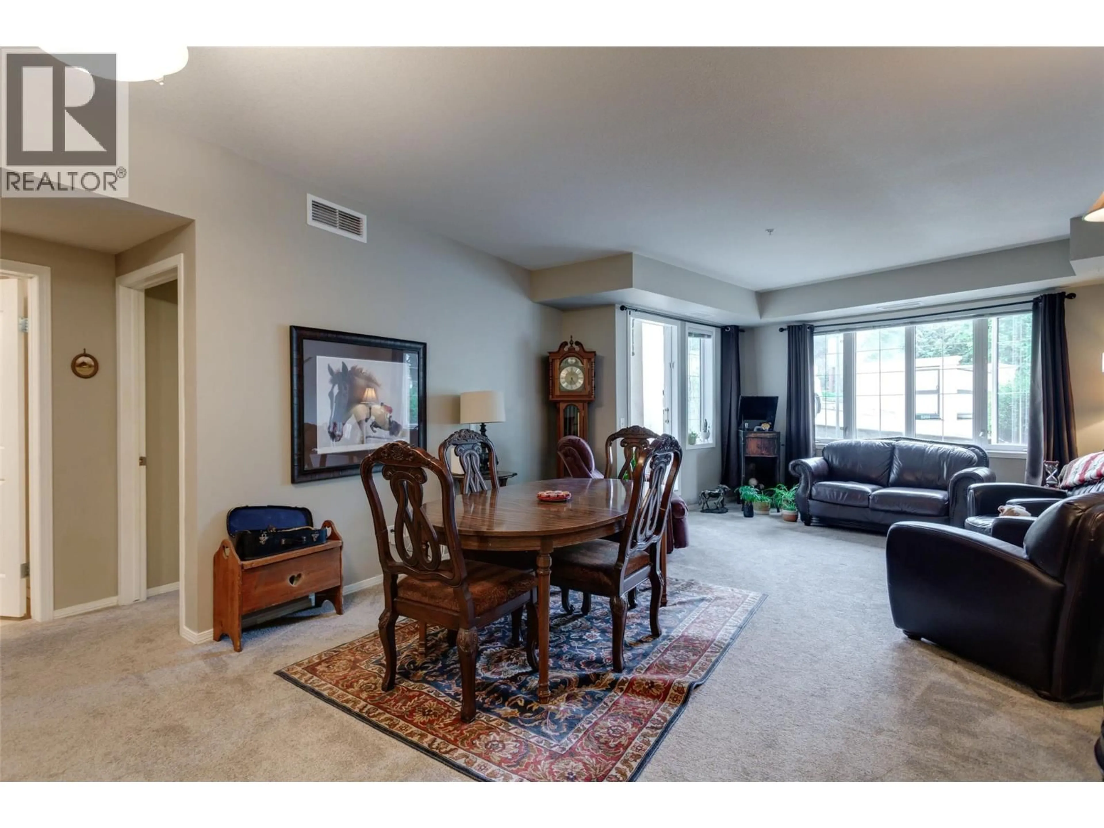 Living room with furniture, carpet floor for 2113 - 3178 VIA CENTRALE ROAD, Kelowna British Columbia V1V2T3