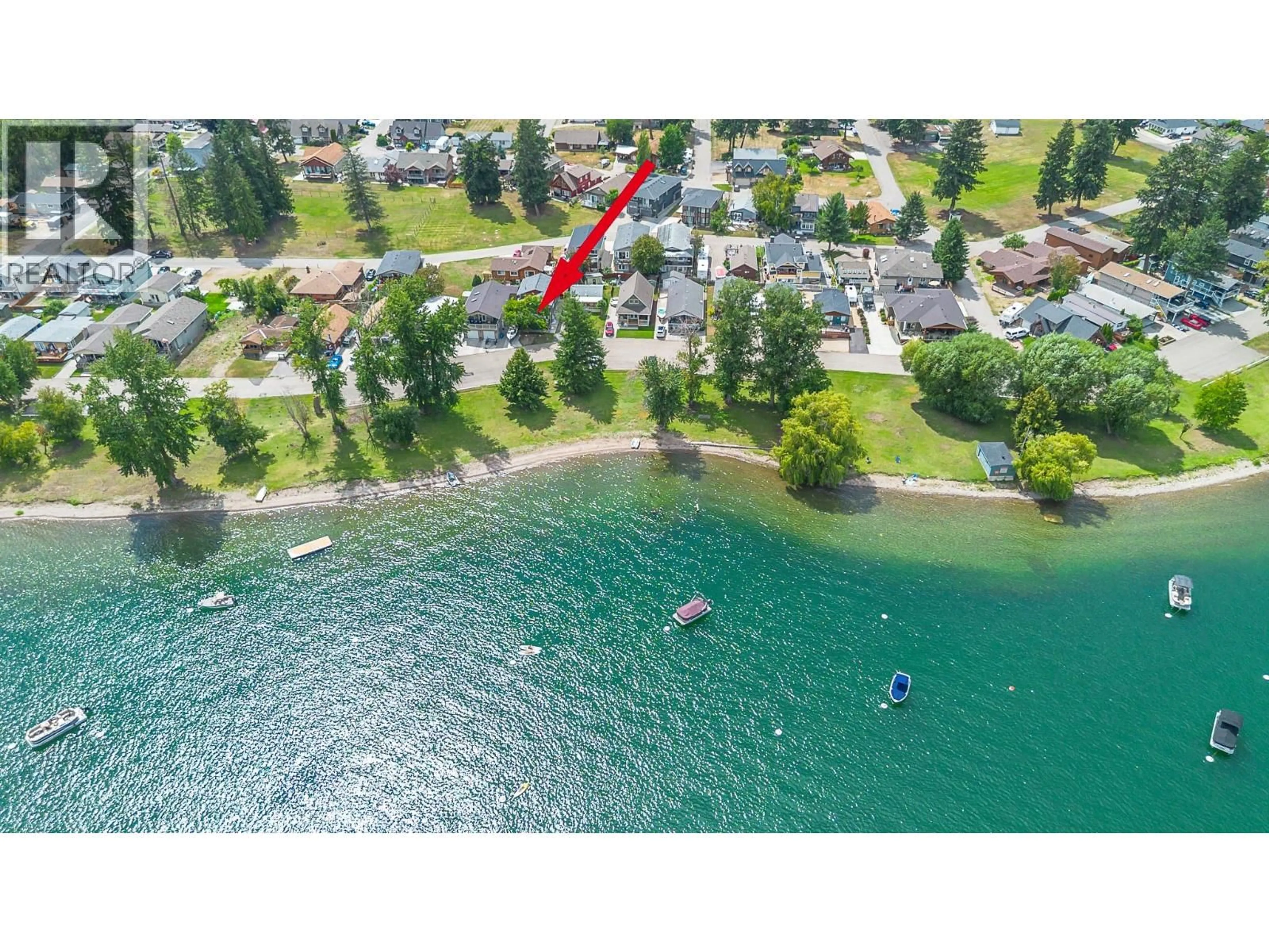 A pic from outside/outdoor area/front of a property/back of a property/a pic from drone, water/lake/river/ocean view for 42 LAKESHORE DRIVE, Vernon British Columbia V1H2A1