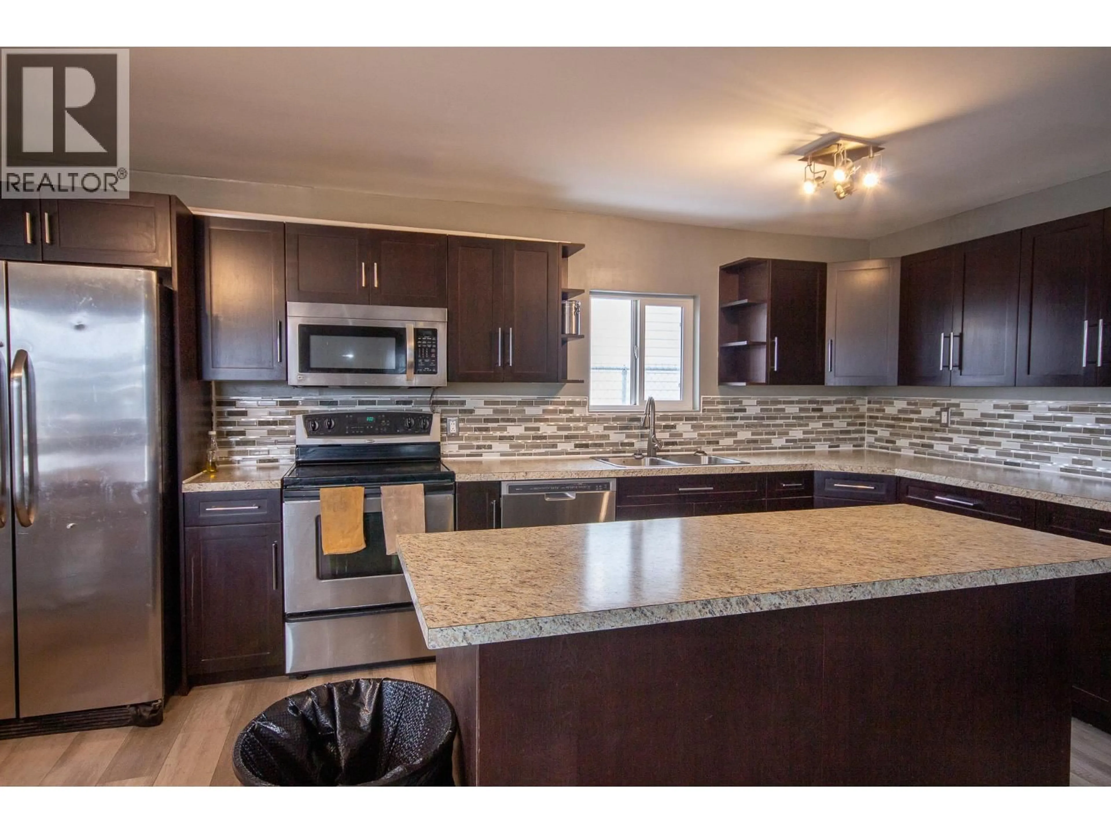 Open concept kitchen, unknown for 1604 108 AVENUE, Dawson Creek British Columbia V1G2T6