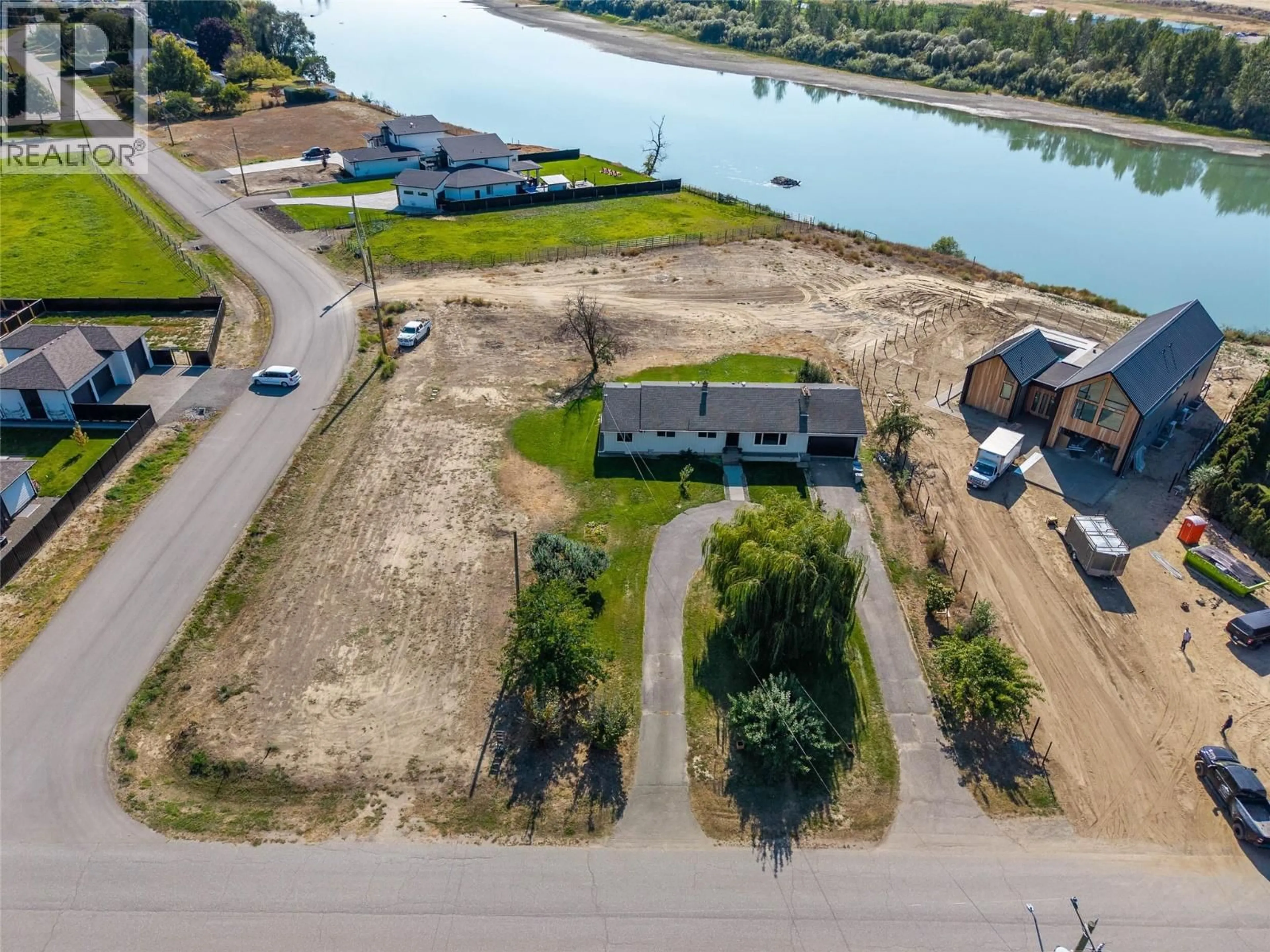 A pic from outside/outdoor area/front of a property/back of a property/a pic from drone, water/lake/river/ocean view for 203 MATTOCH MCKEAGUE ROAD, Kamloops British Columbia V2H1L2
