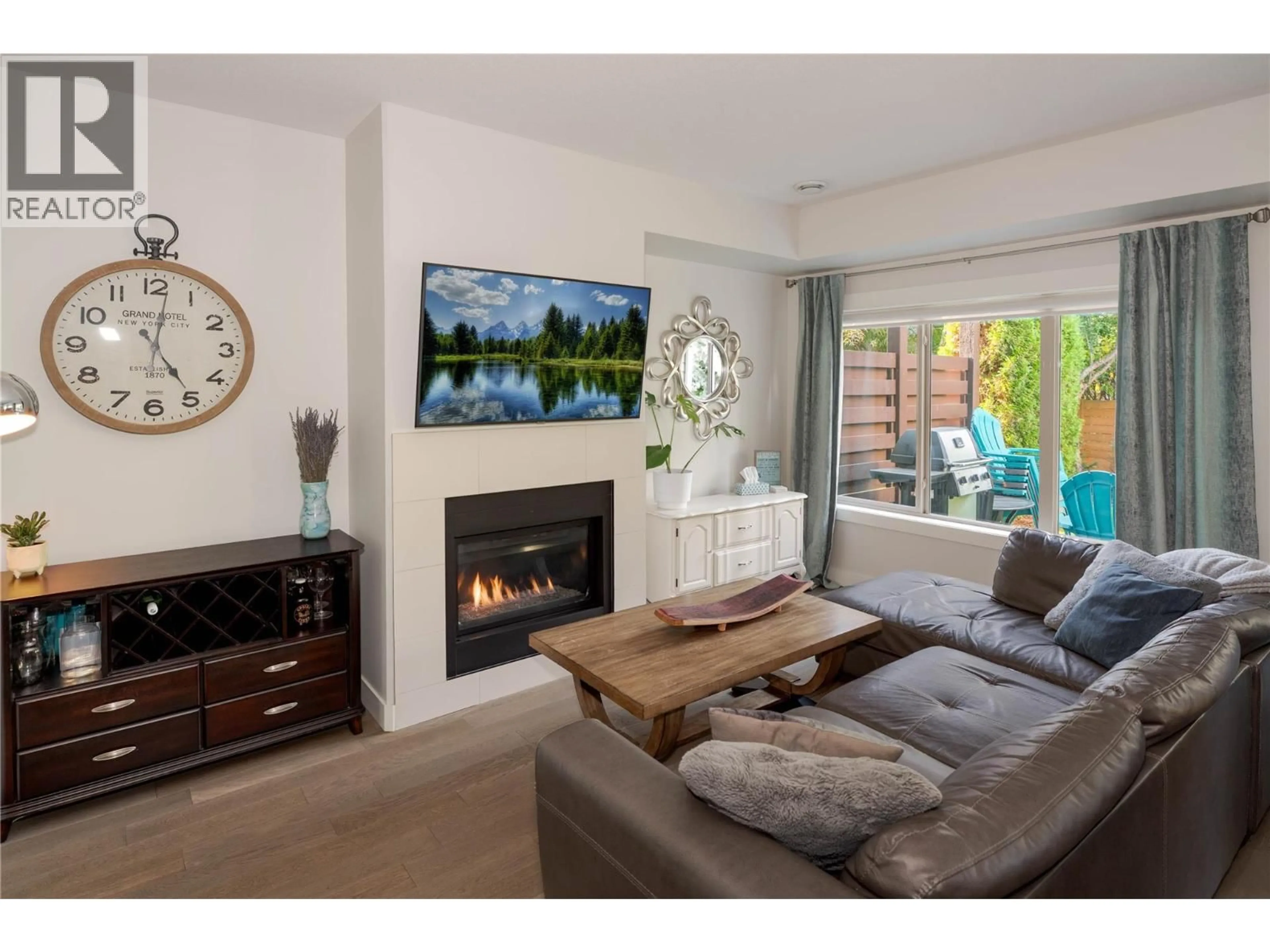 Living room with furniture, unknown for 703 - 3350 WOODSDALE ROAD, Lake Country British Columbia V4V2R7