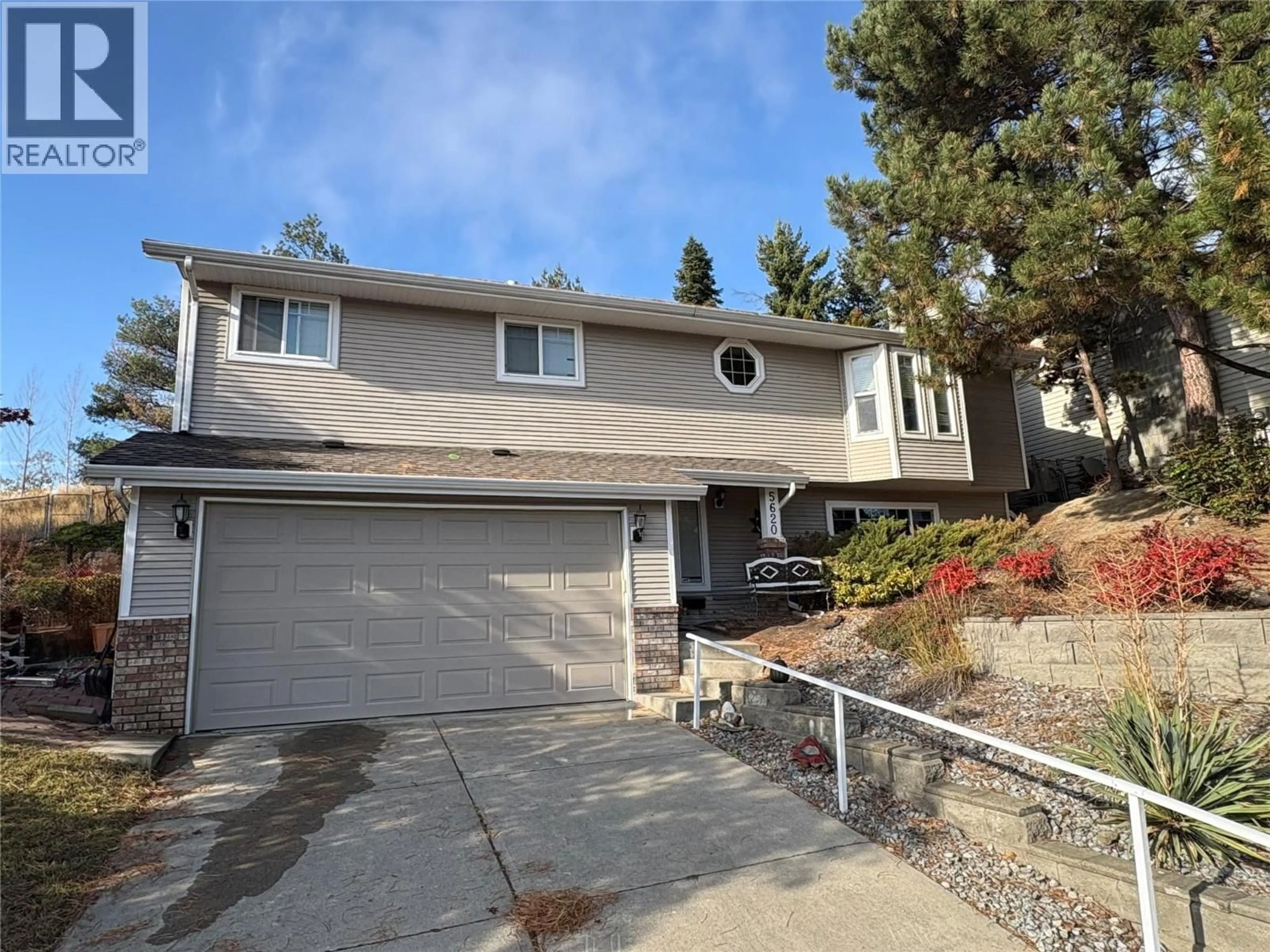 Home with vinyl exterior material, street for 5620 ALLENBY CRESCENT, Vernon British Columbia V1T8P8