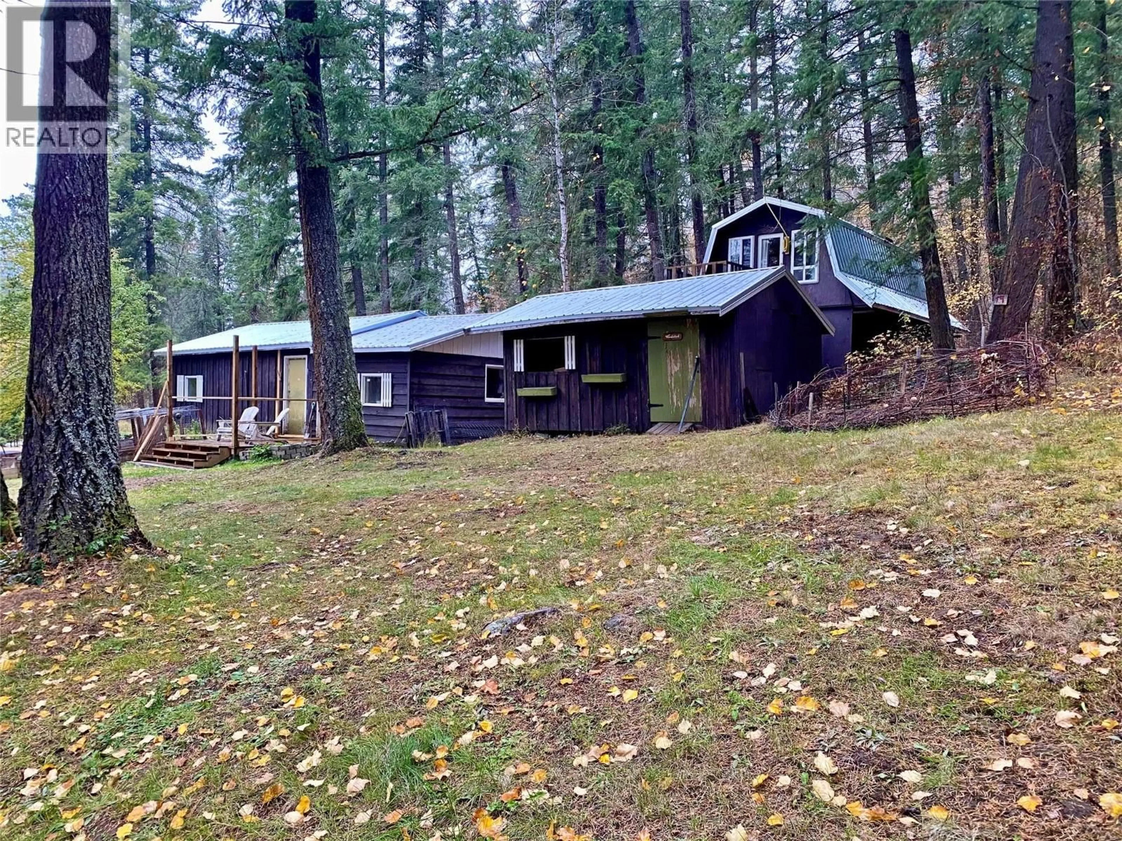 A pic from outside/outdoor area/front of a property/back of a property/a pic from drone, forest/trees view for 541 24 HIGHWAY, Little Fort British Columbia V0E1C0