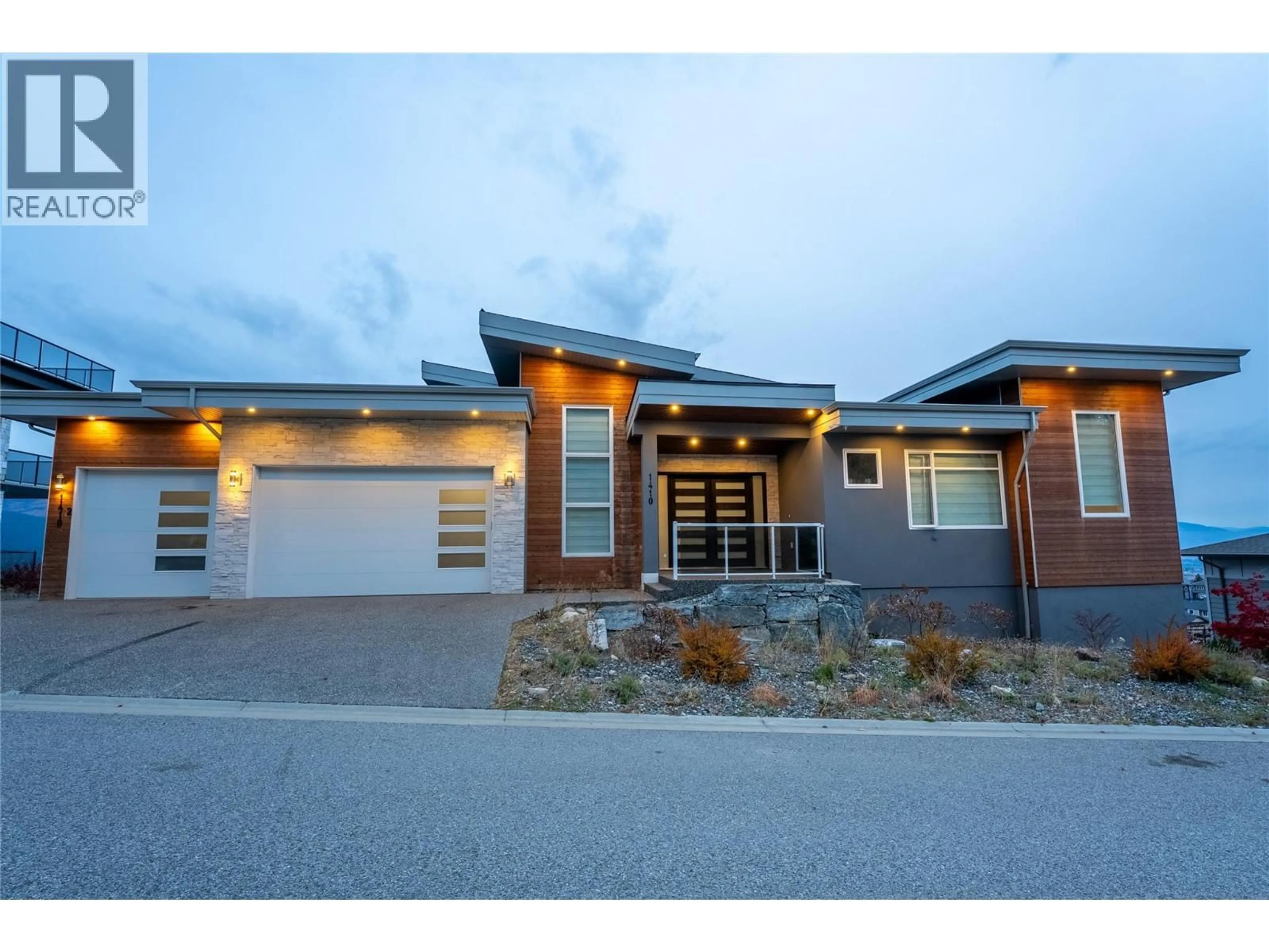 Home with brick exterior material, street for 1410 MINE HILL LANE, Kelowna British Columbia V1P1T6
