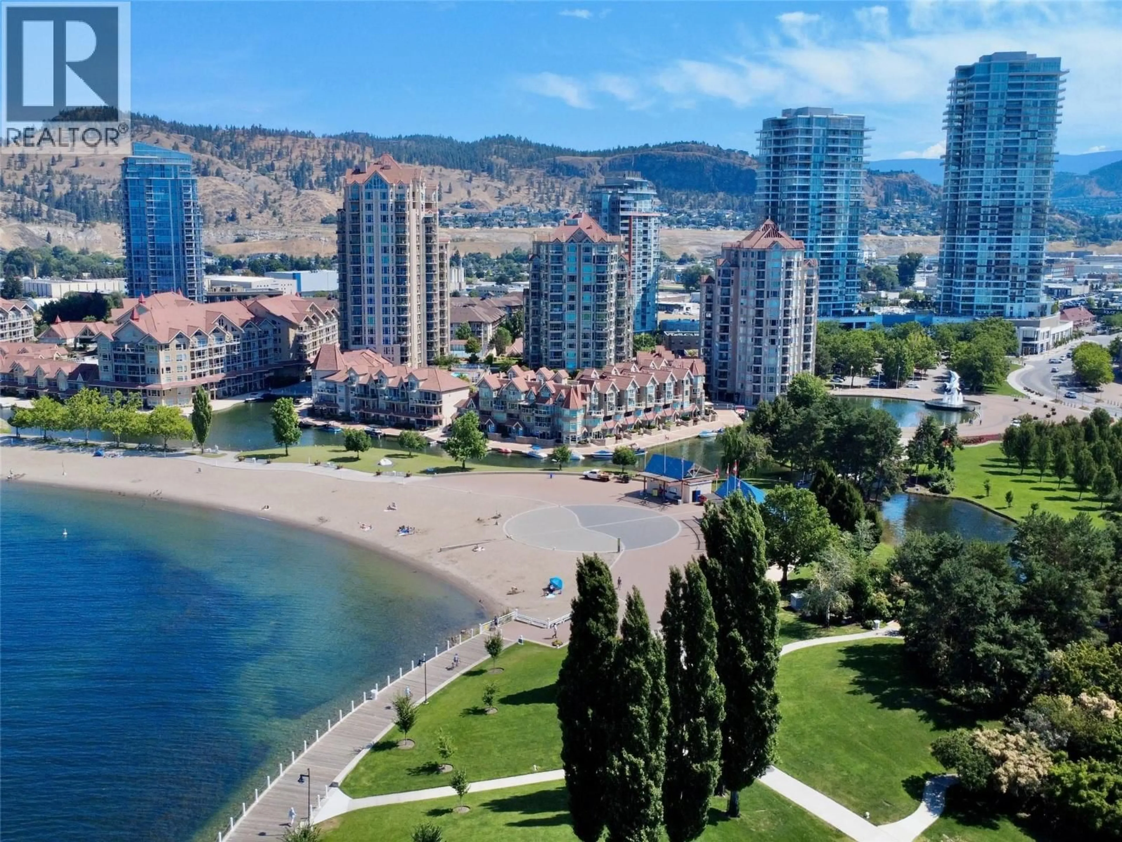 A pic from outside/outdoor area/front of a property/back of a property/a pic from drone, water/lake/river/ocean view for 1702 - 1152 SUNSET DRIVE, Kelowna British Columbia V1Y9R7