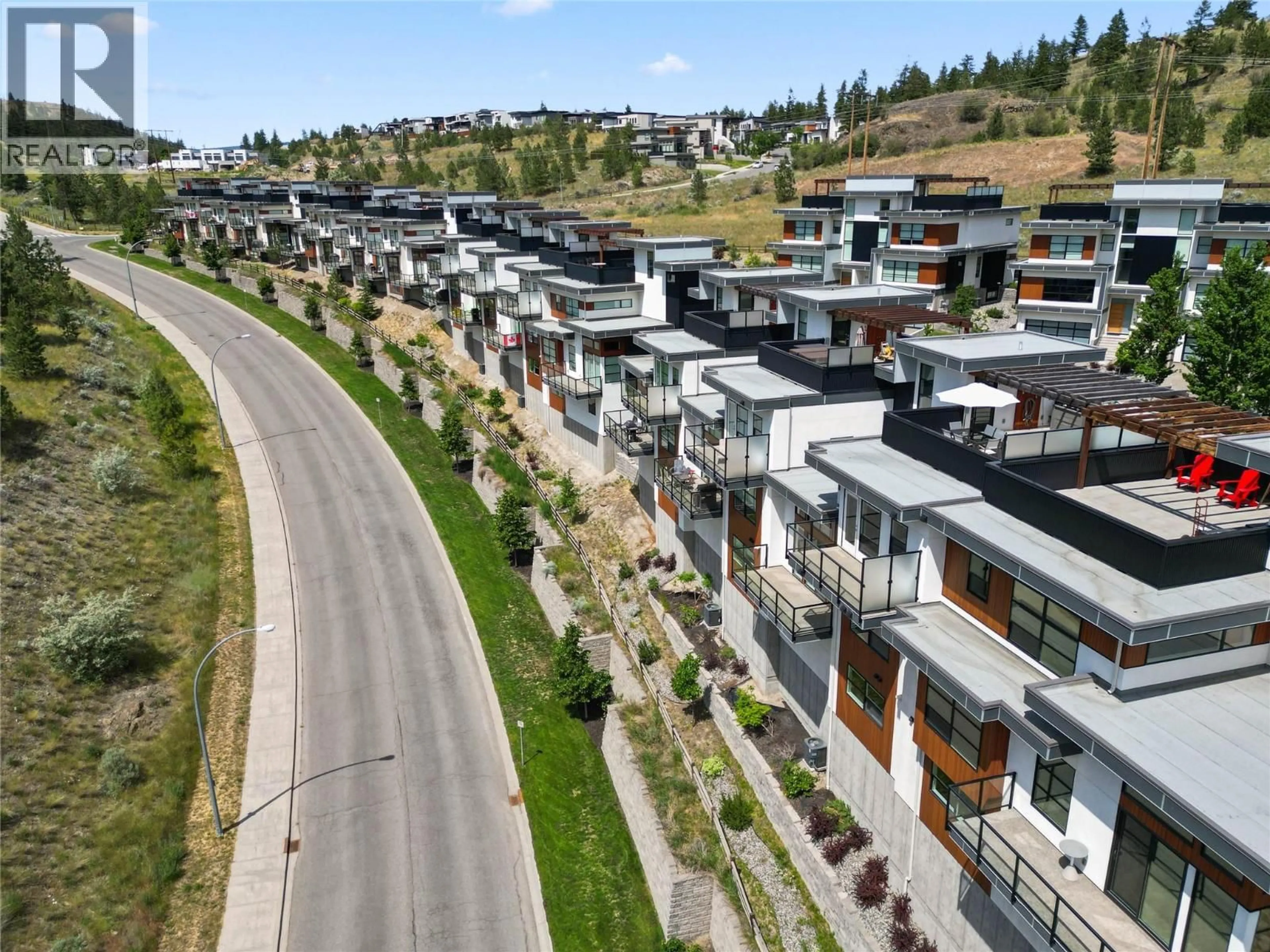 A pic from outside/outdoor area/front of a property/back of a property/a pic from drone, street for 15 - 1395 PRAIRIE ROSE DRIVE, Kamloops British Columbia V2E0B9