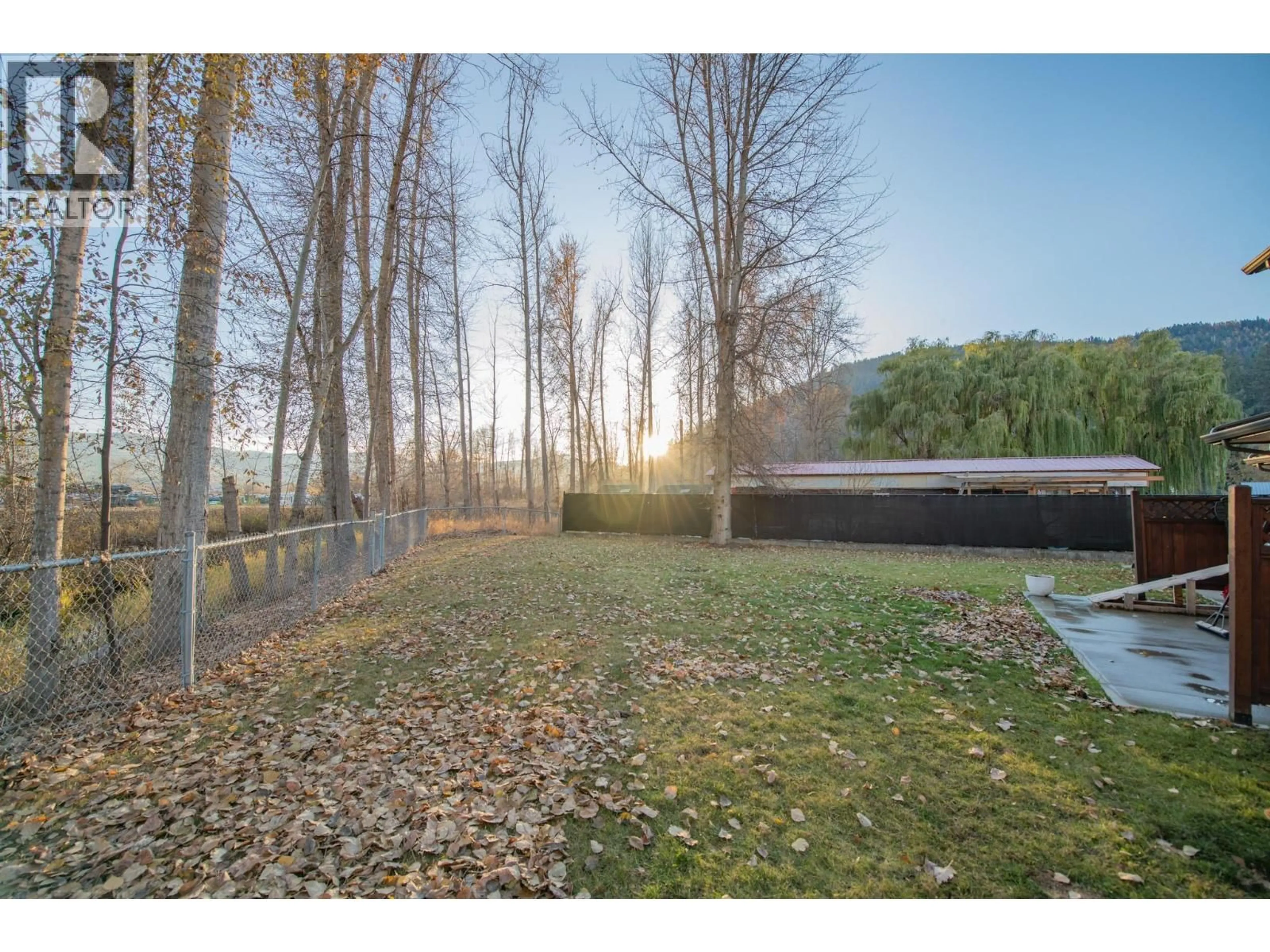 A pic from outside/outdoor area/front of a property/back of a property/a pic from drone, forest/trees view for 11 - 2156 BESSETTE STREET, Lumby British Columbia V0E2G0