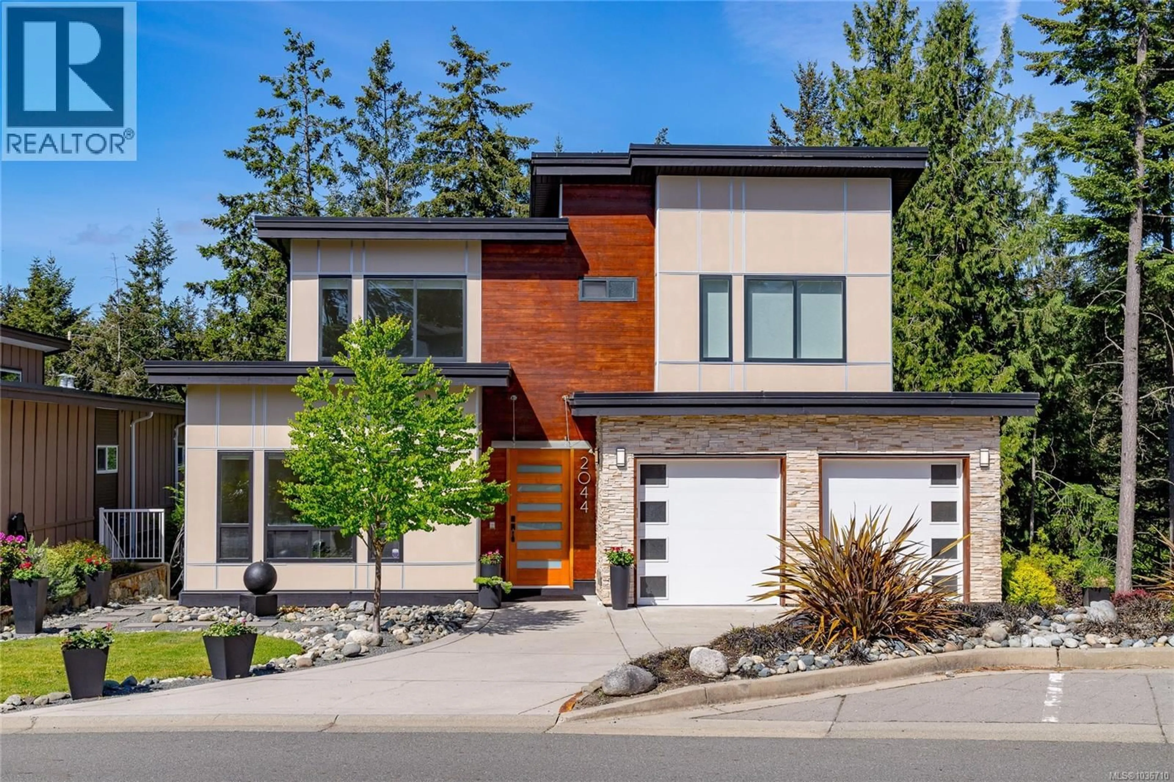 Home with brick exterior material, street for 2044 RIVERS CROSSING, Highlands British Columbia V9B0S6