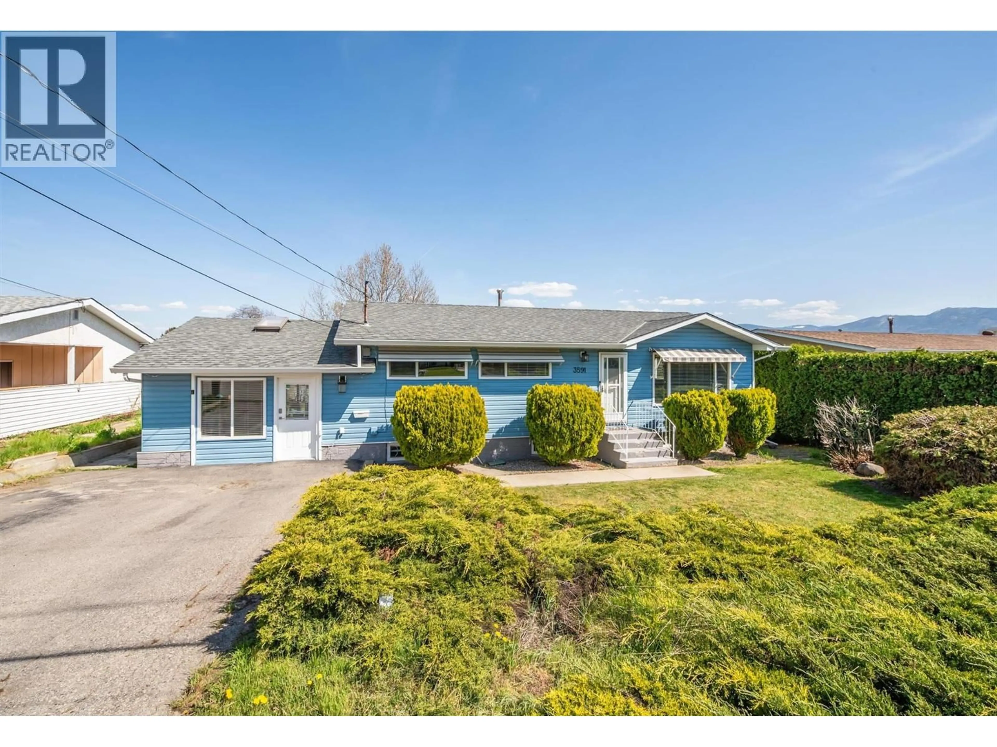 A pic from outside/outdoor area/front of a property/back of a property/a pic from drone, street for 3591 BROWN ROAD, West Kelowna British Columbia V4T1P5