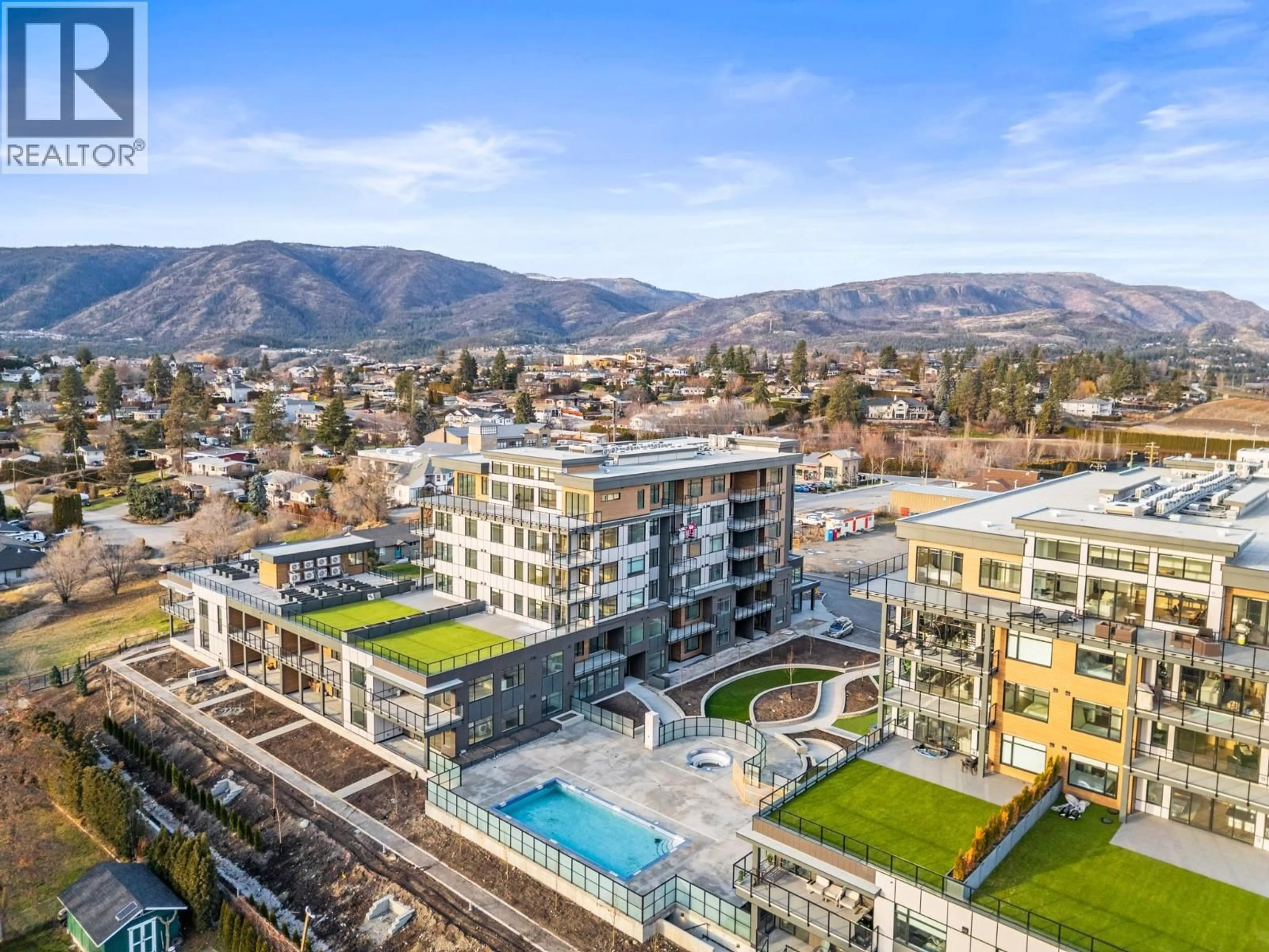 A pic from outside/outdoor area/front of a property/back of a property/a pic from drone, mountain view for 604 - 2760 OLALLA ROAD, West Kelowna British Columbia V1Z2A9