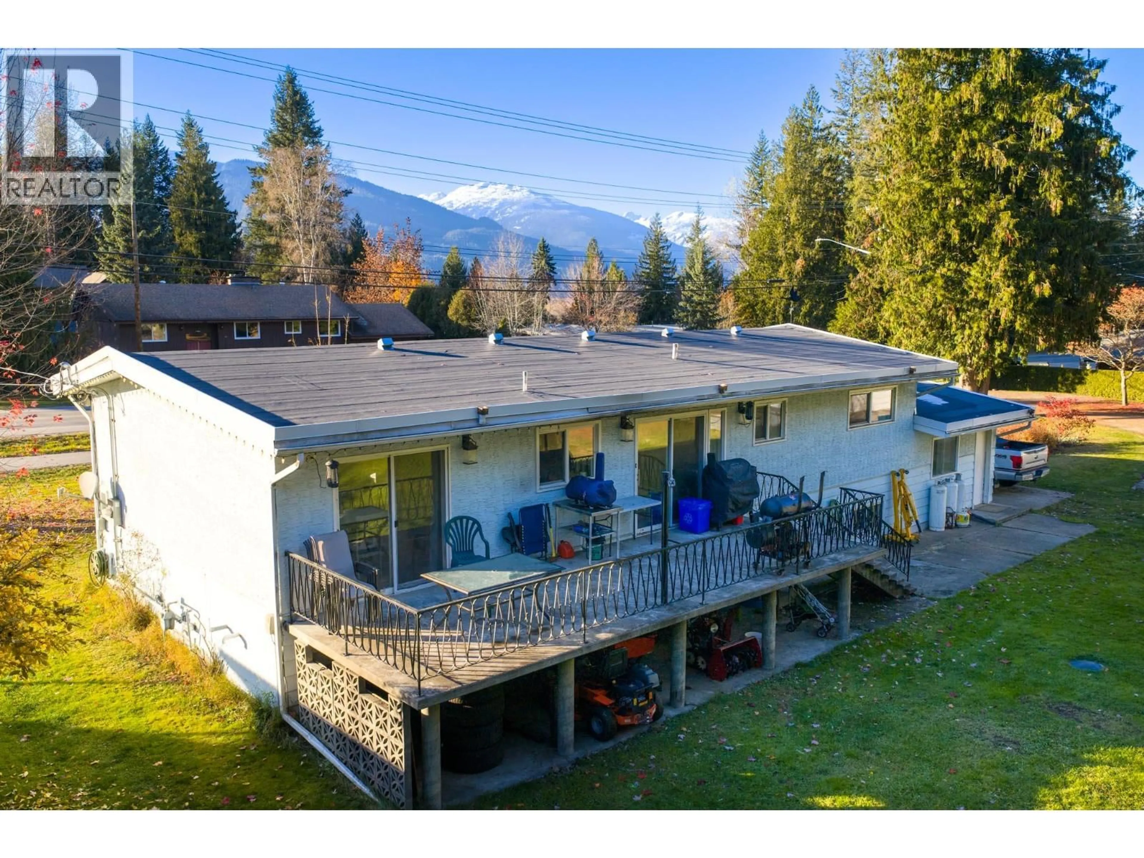 A pic from outside/outdoor area/front of a property/back of a property/a pic from drone, mountain view for 1840 AIRPORT WAY, Revelstoke British Columbia V0E2S1