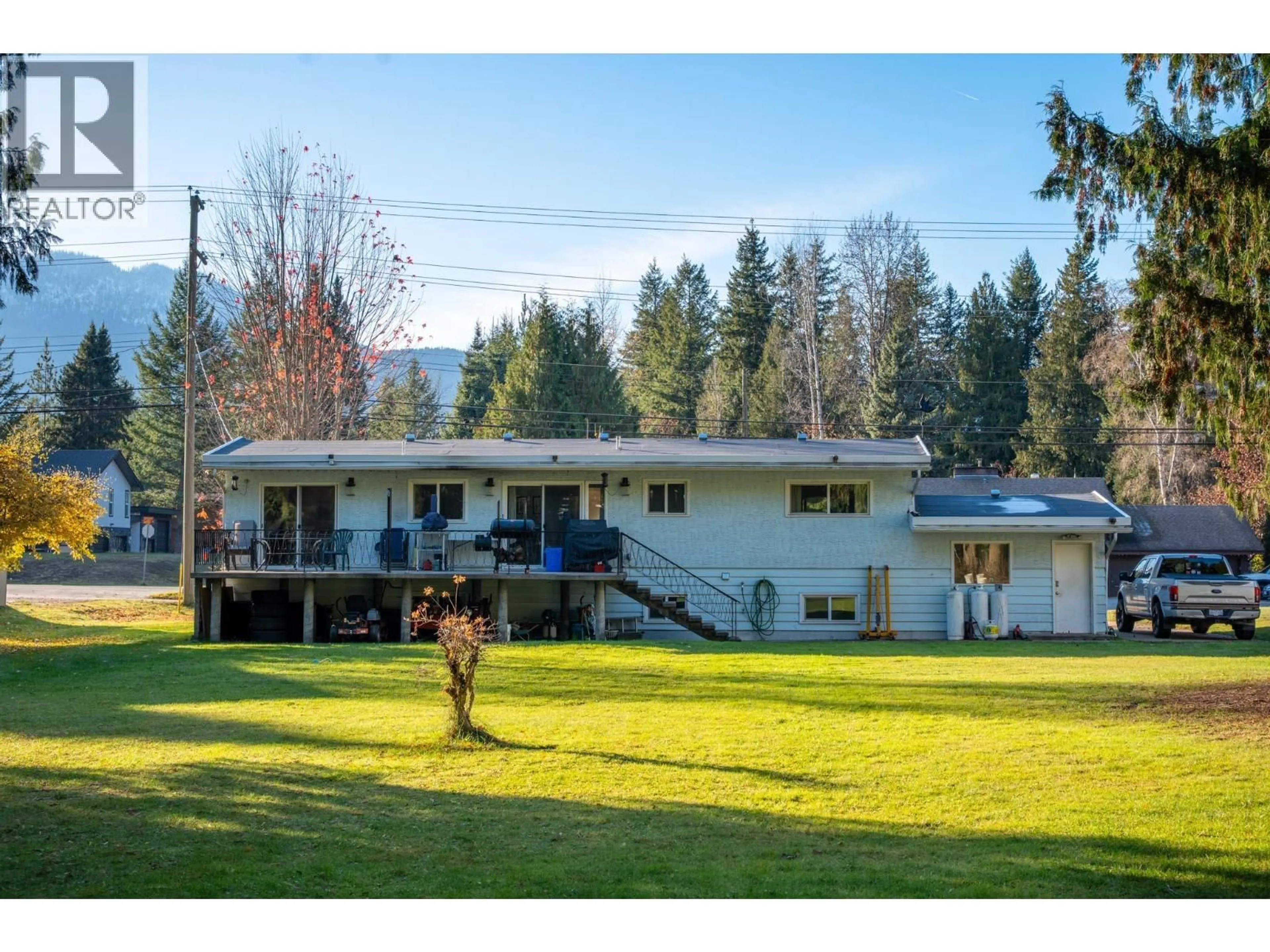 A pic from outside/outdoor area/front of a property/back of a property/a pic from drone, mountain view for 1840 AIRPORT WAY, Revelstoke British Columbia V0E2S1