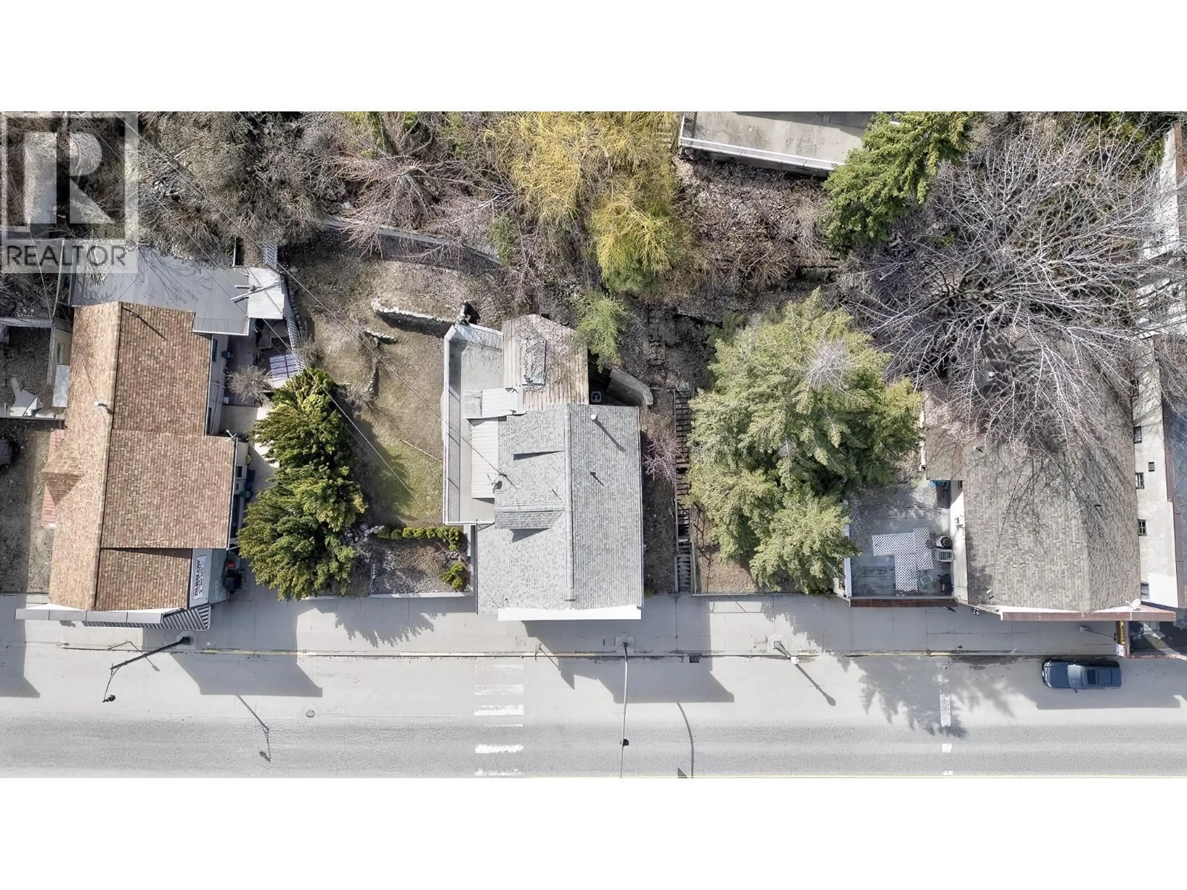 A pic from outside/outdoor area/front of a property/back of a property/a pic from drone, street for 792 ROSSLAND AVENUE, Trail British Columbia V1R3N3