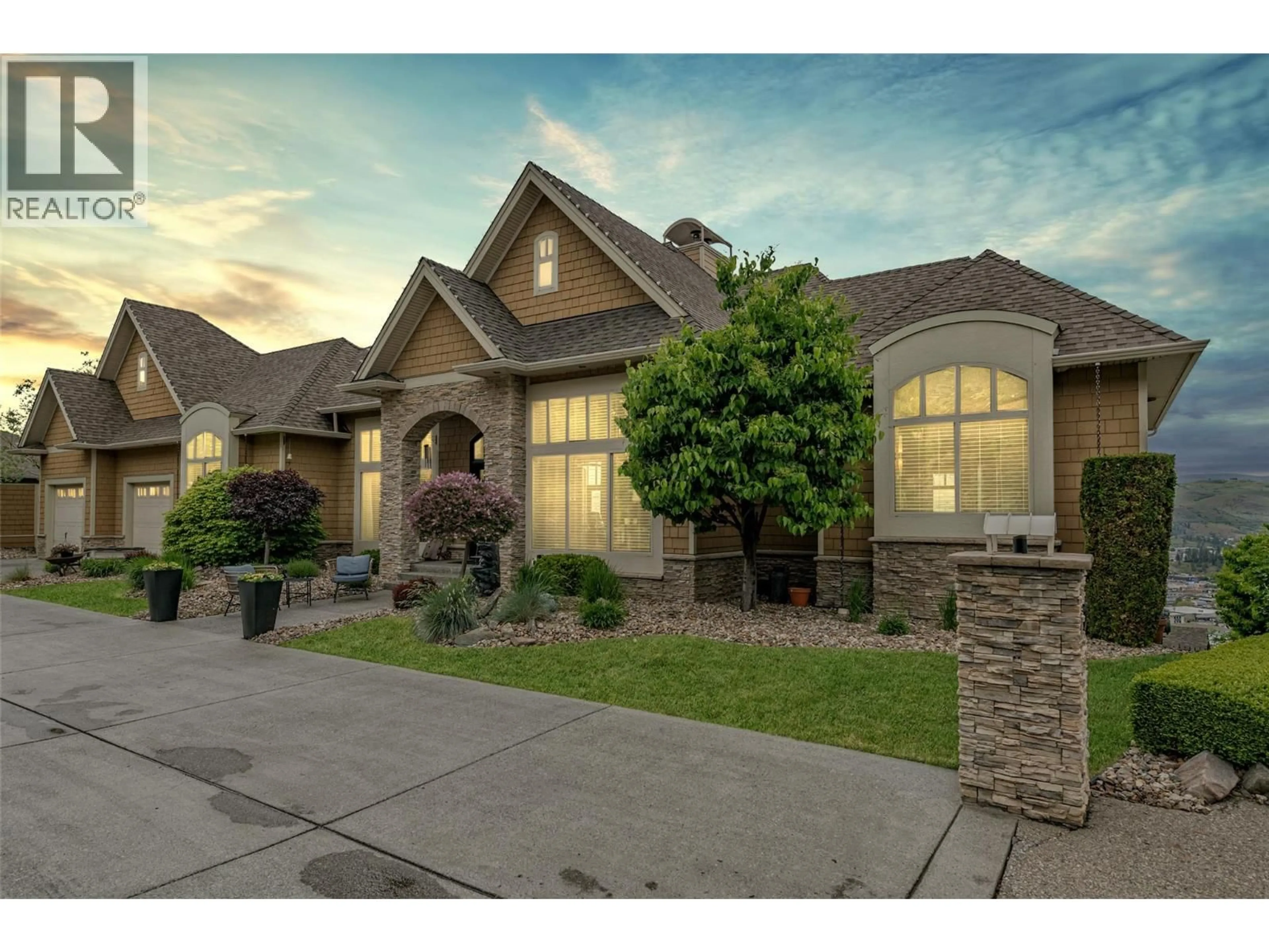 Home with brick exterior material, street for 10 - 1117 MT FOSTHALL DRIVE, Vernon British Columbia V1B3Z9