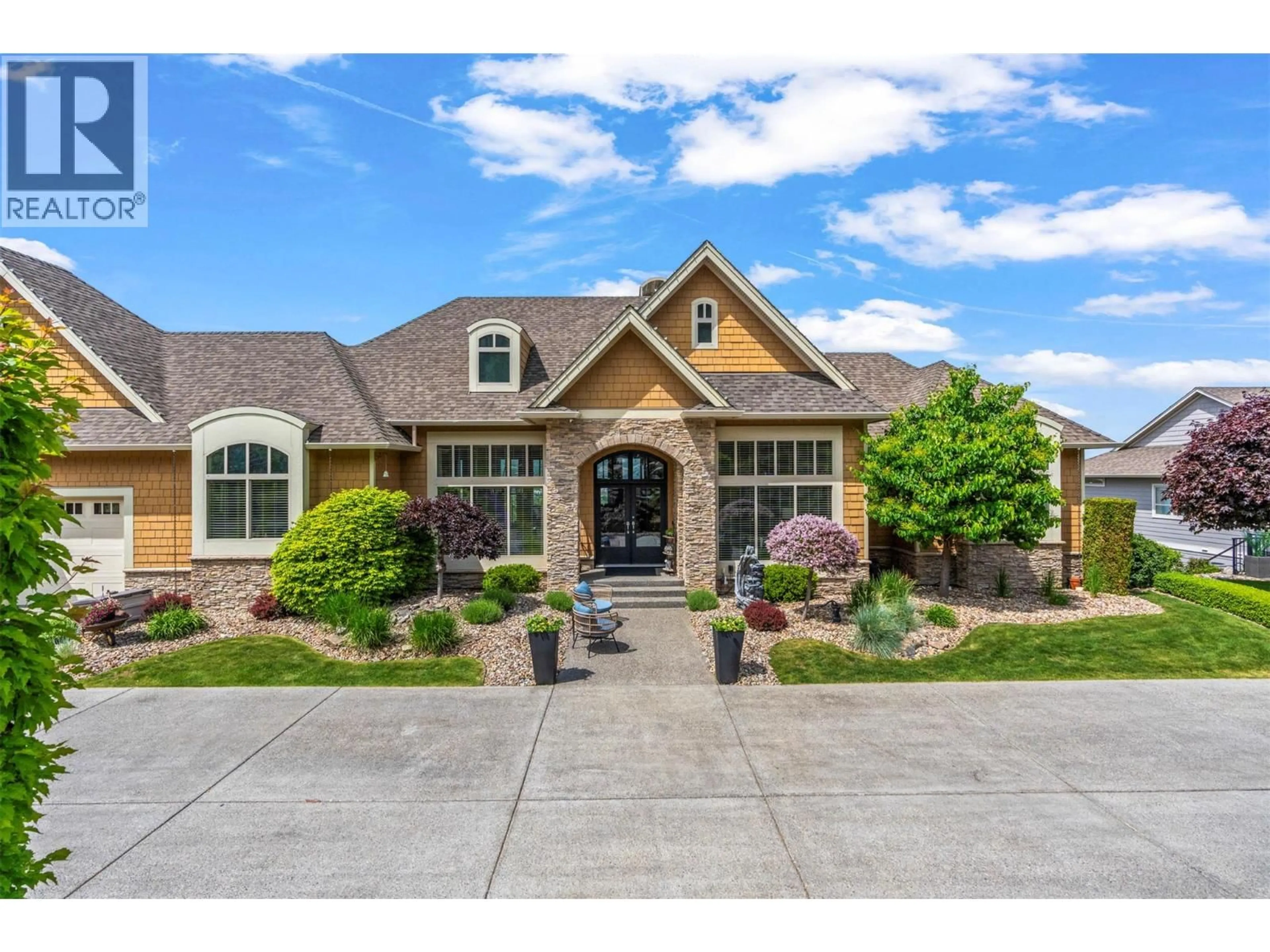 Home with brick exterior material, street for 10 - 1117 MT FOSTHALL DRIVE, Vernon British Columbia V1B3Z9