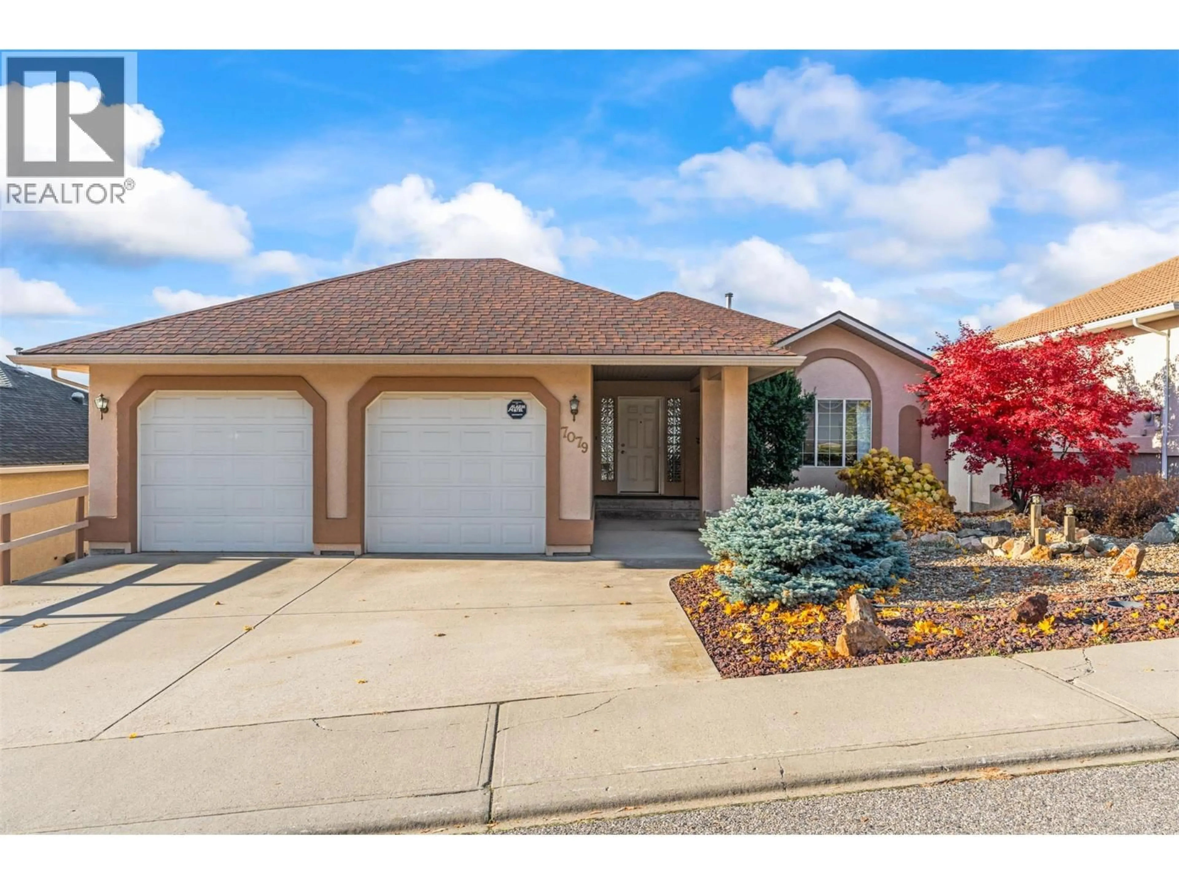 Home with brick exterior material, street for 7079 FOOTHILLS PLACE, Vernon British Columbia V1B2Y4