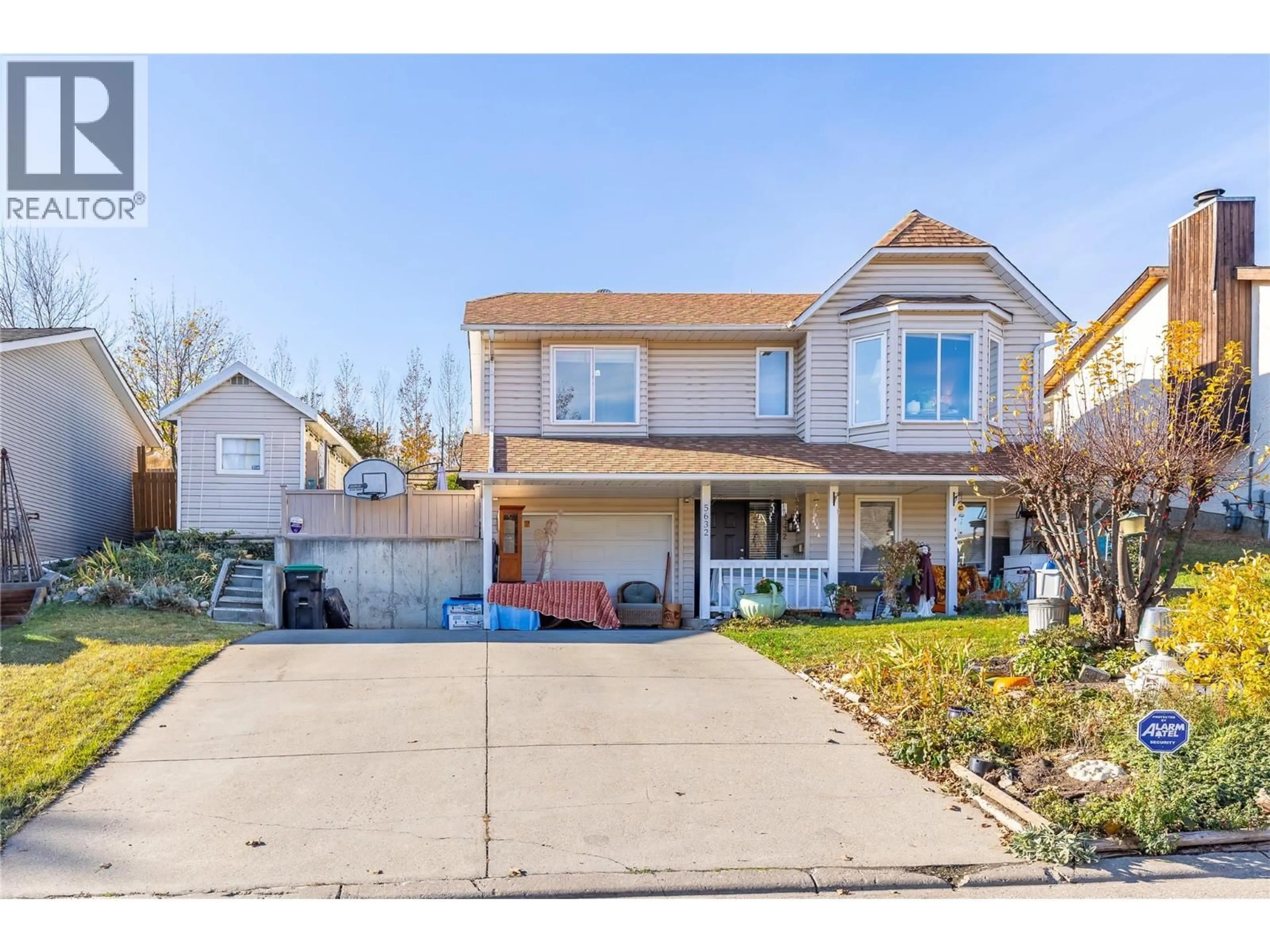 Home with vinyl exterior material, street for 5632 ALLENBY CRESCENT, Vernon British Columbia V1T8P8
