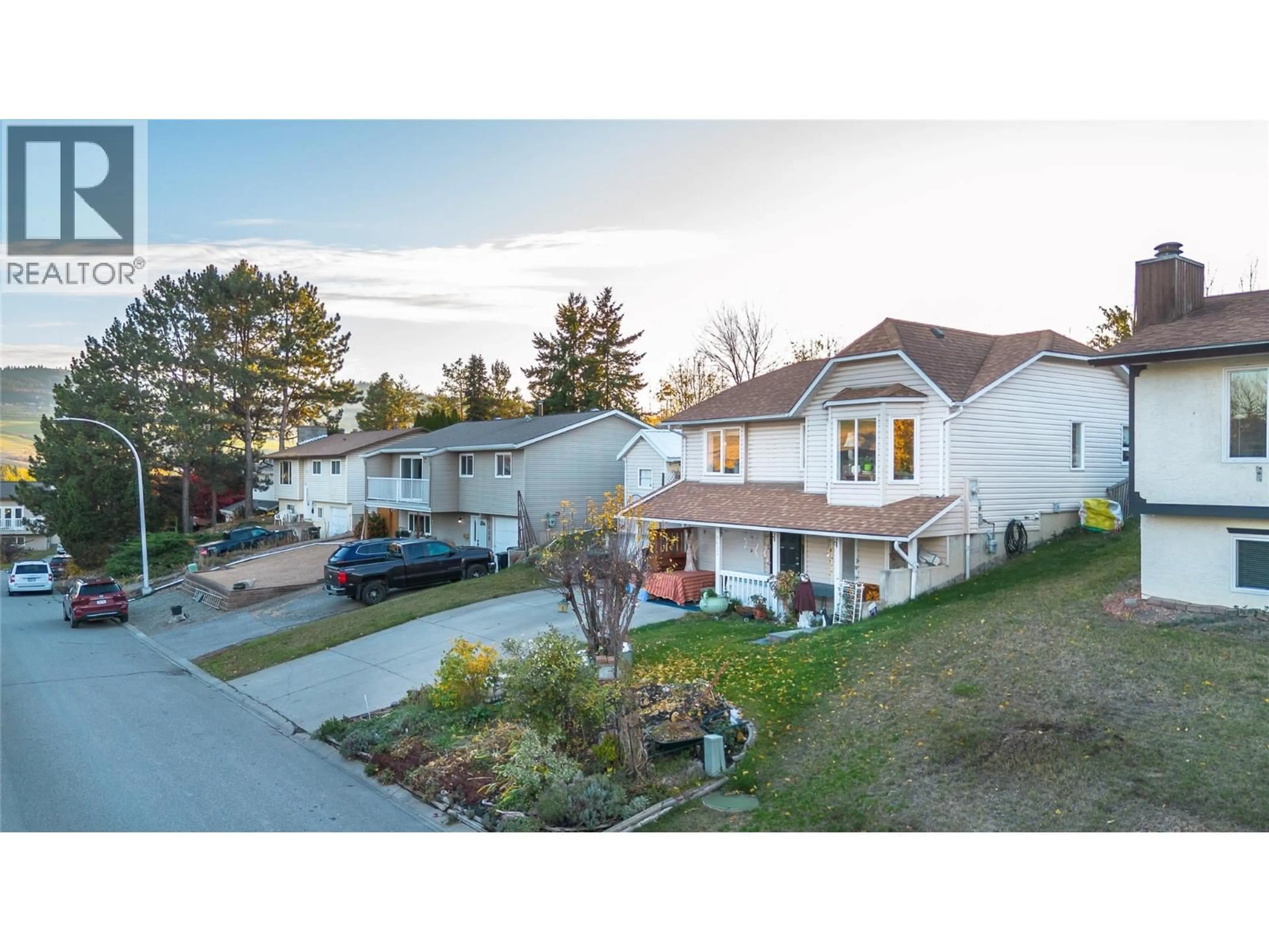 A pic from outside/outdoor area/front of a property/back of a property/a pic from drone, street for 5632 ALLENBY CRESCENT, Vernon British Columbia V1T8P8