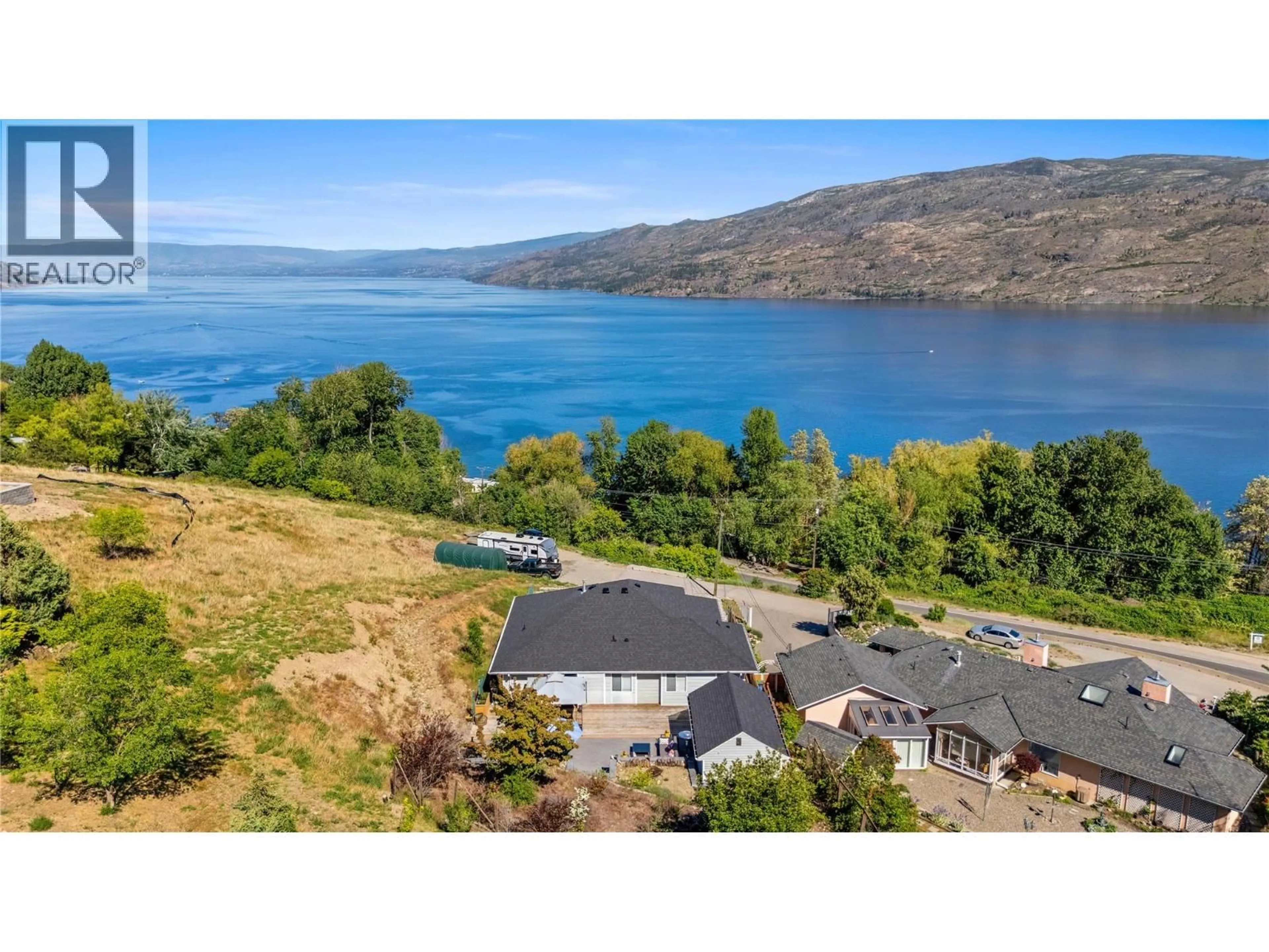 A pic from outside/outdoor area/front of a property/back of a property/a pic from drone, water/lake/river/ocean view for 4622 PRINCETON AVENUE, Peachland British Columbia V0H1X7