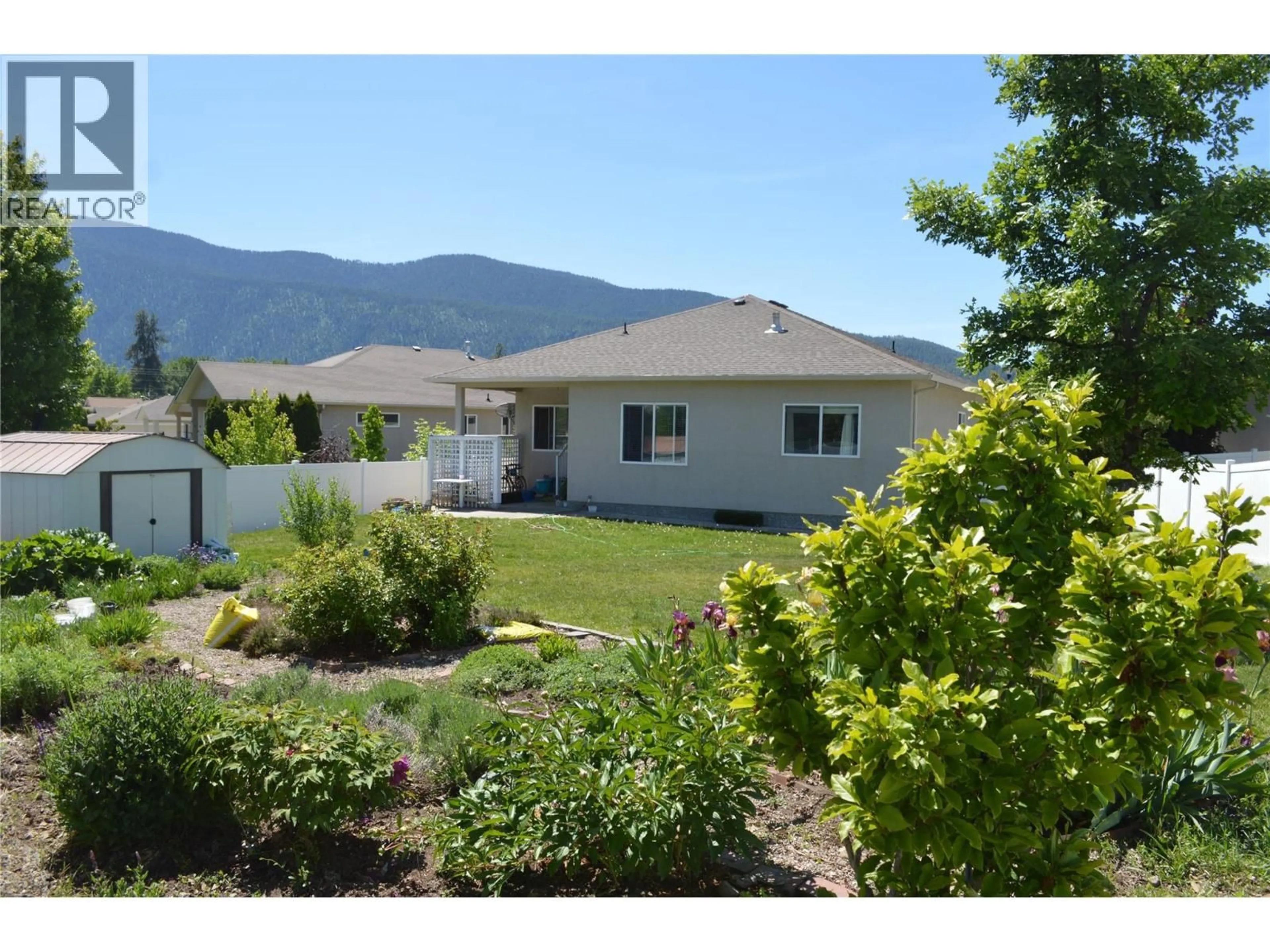 A pic from outside/outdoor area/front of a property/back of a property/a pic from drone, mountain view for 2170 BRYCEN PLACE, Grand Forks British Columbia V0H1H0