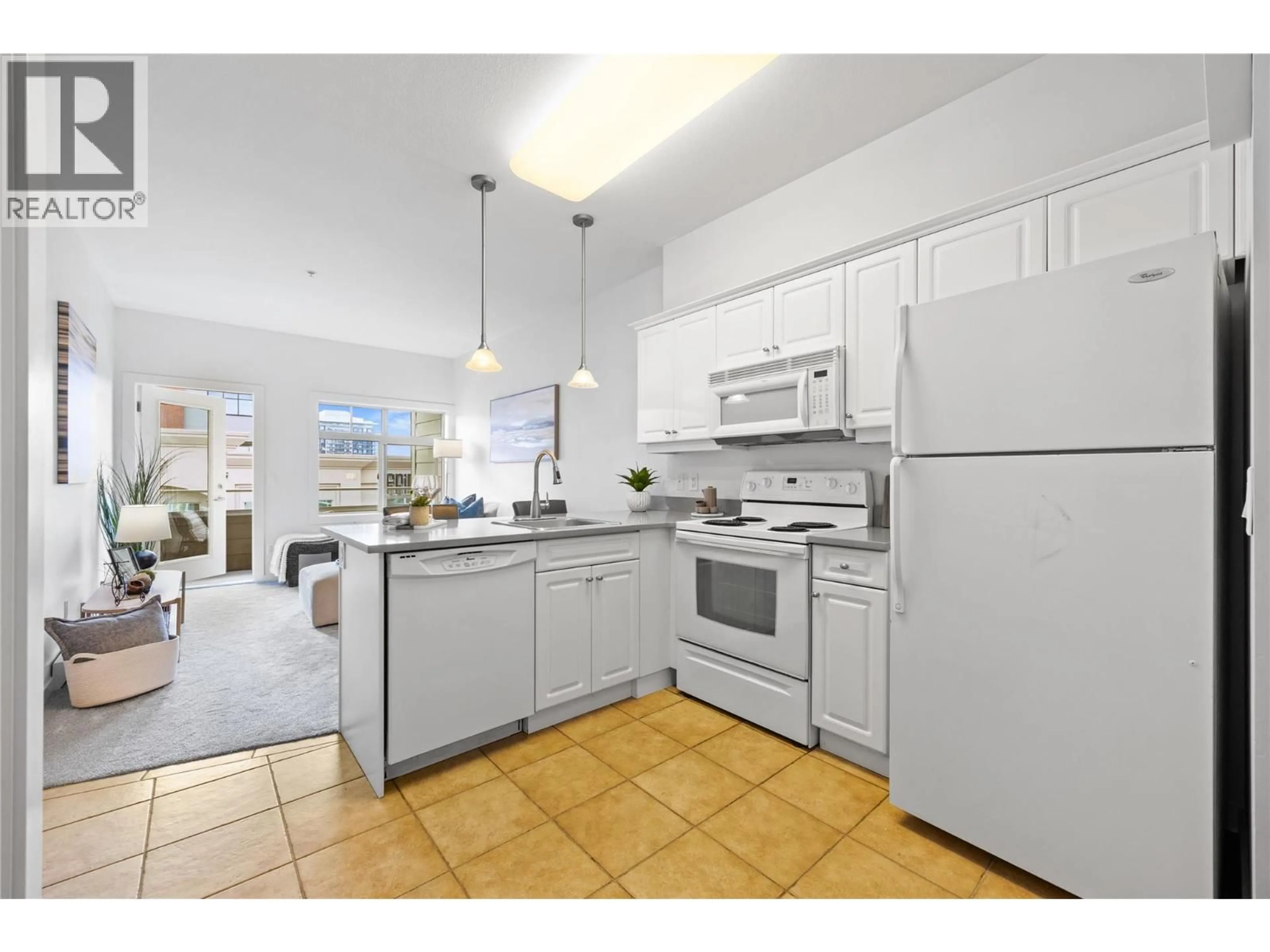 Standard kitchen, ceramic/tile floor for 302 - 538 MCKAY AVENUE, Kelowna British Columbia V1Y5A8