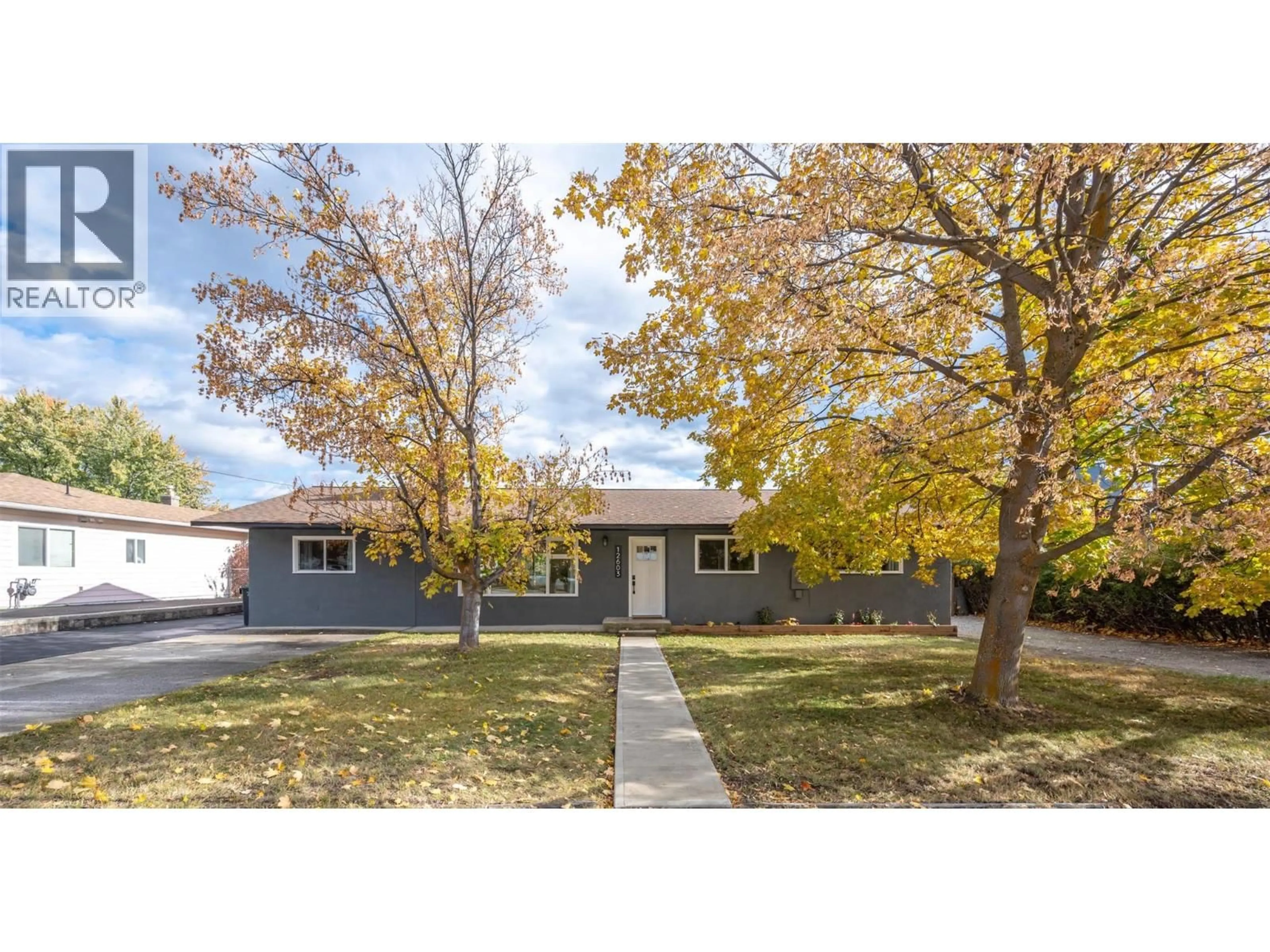 Home with vinyl exterior material, street for 12603 WRIGHT AVENUE, Summerland British Columbia V0H1Z4