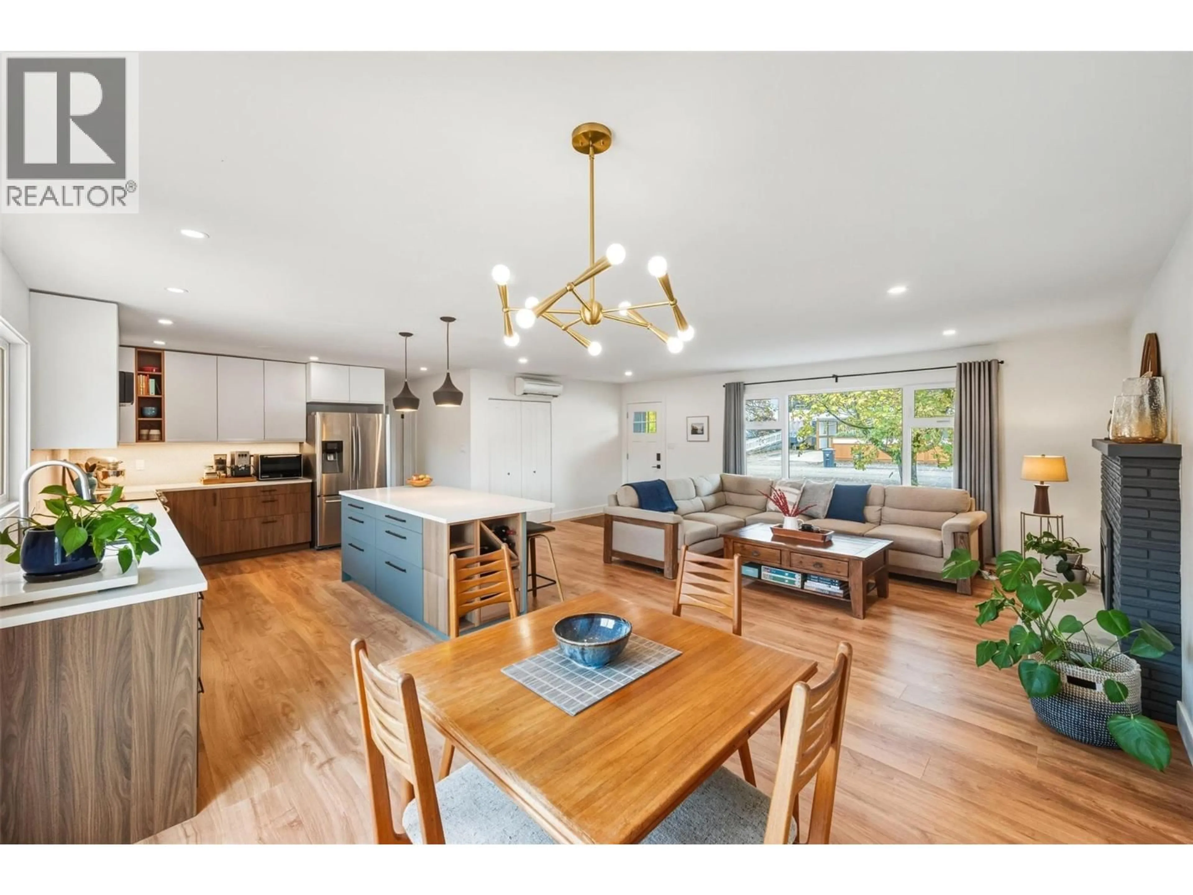 Open concept kitchen, wood/laminate floor for 12603 WRIGHT AVENUE, Summerland British Columbia V0H1Z4