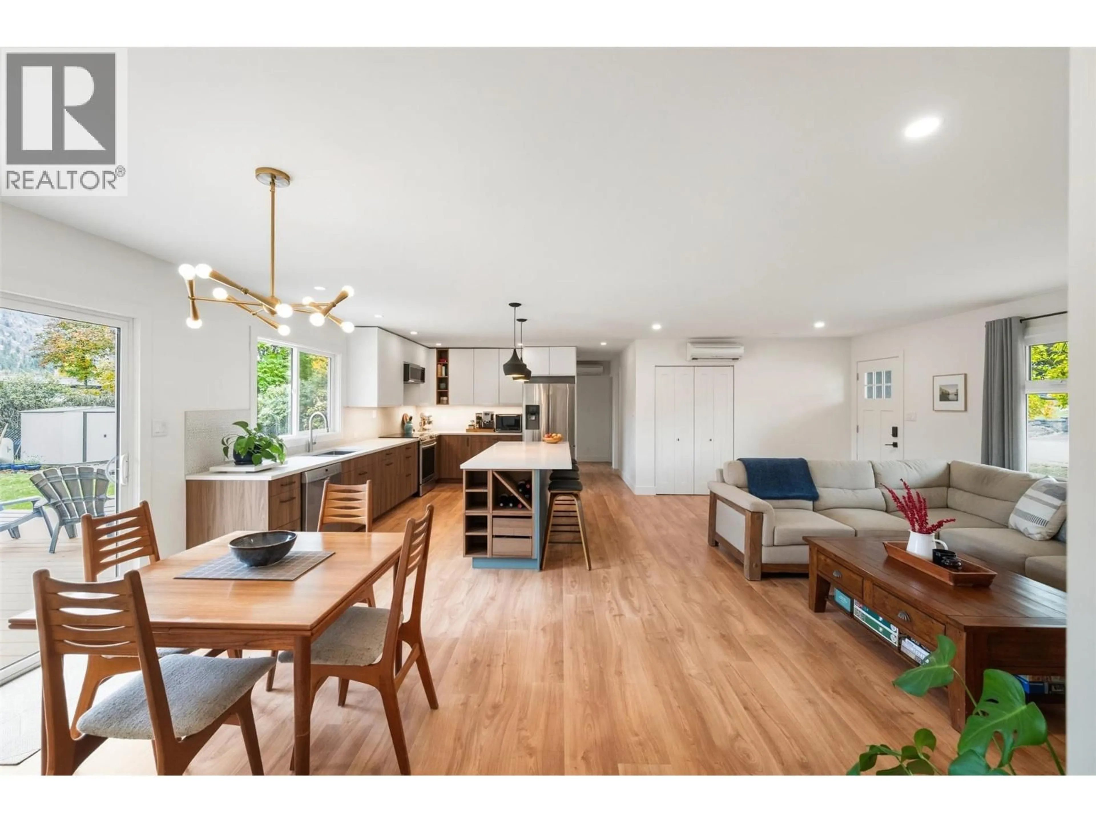 Open concept kitchen, wood/laminate floor for 12603 WRIGHT AVENUE, Summerland British Columbia V0H1Z4