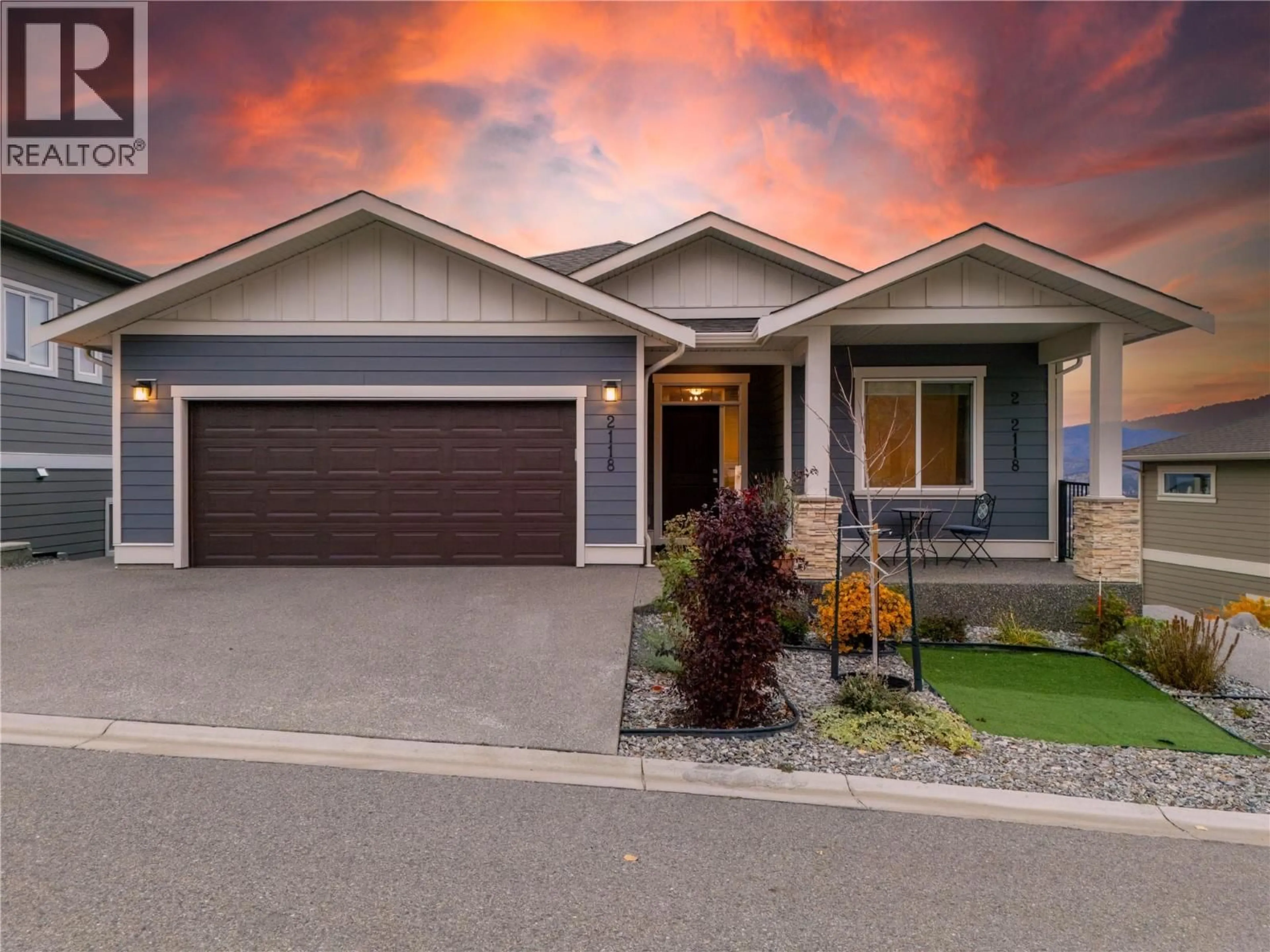 Home with vinyl exterior material, street for 2118 RYEGRASS ROAD, Kelowna British Columbia V1Y0A2
