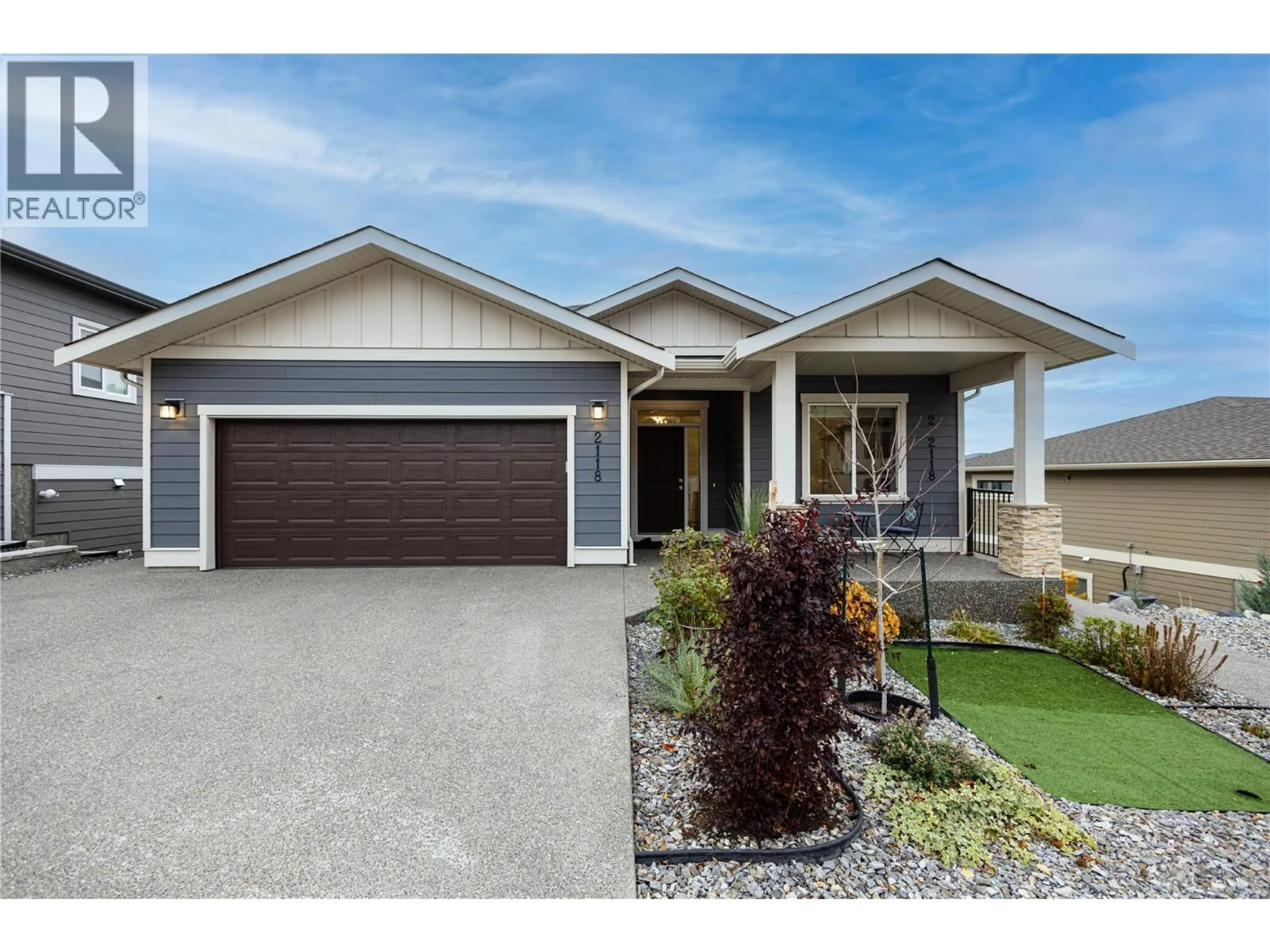 Home with vinyl exterior material, street for 2118 RYEGRASS ROAD, Kelowna British Columbia V1Y0A2