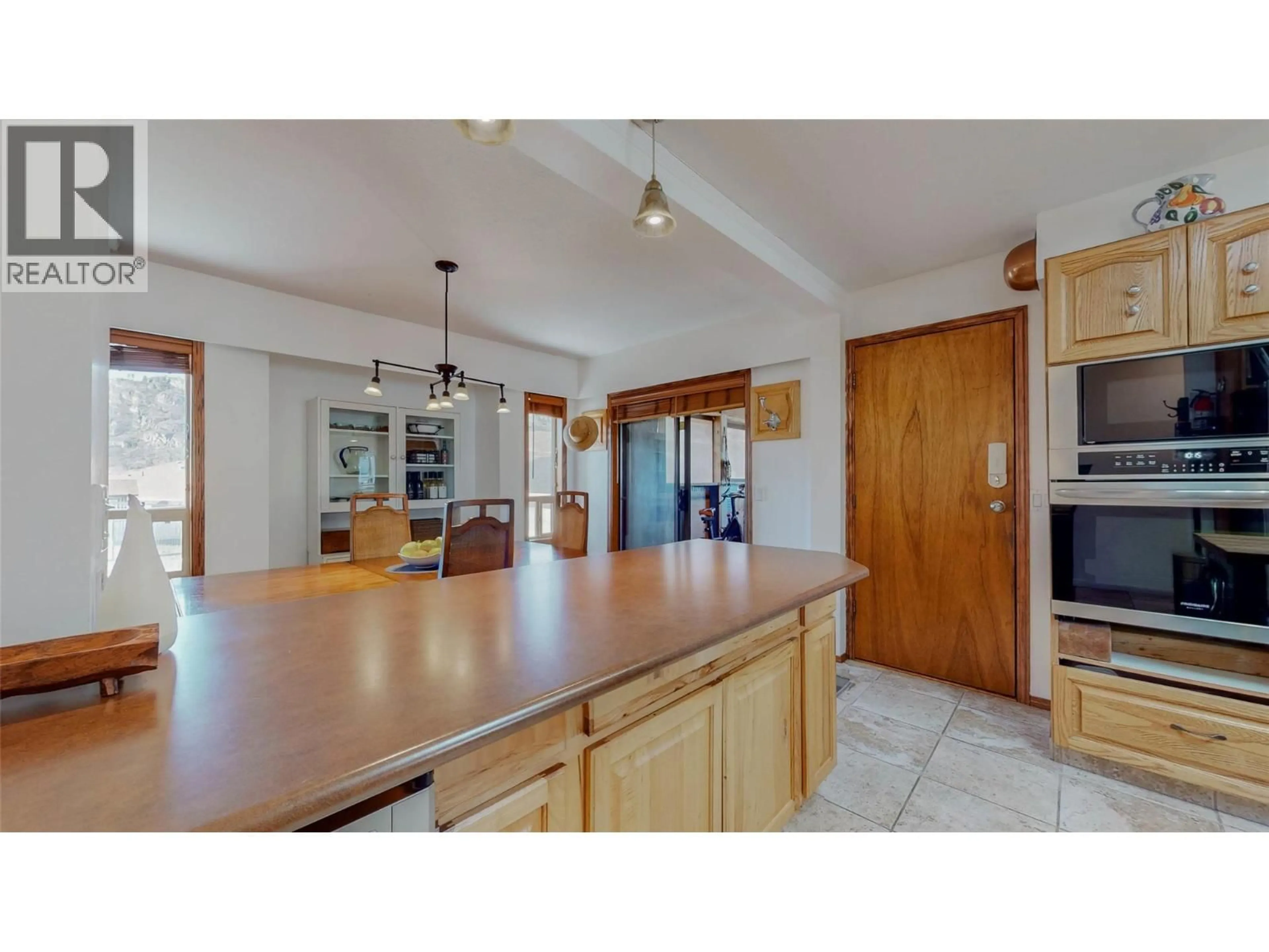 Open concept kitchen, ceramic/tile floor for 6940 MOUNTAINVIEW DRIVE, Oliver British Columbia V0H1T0
