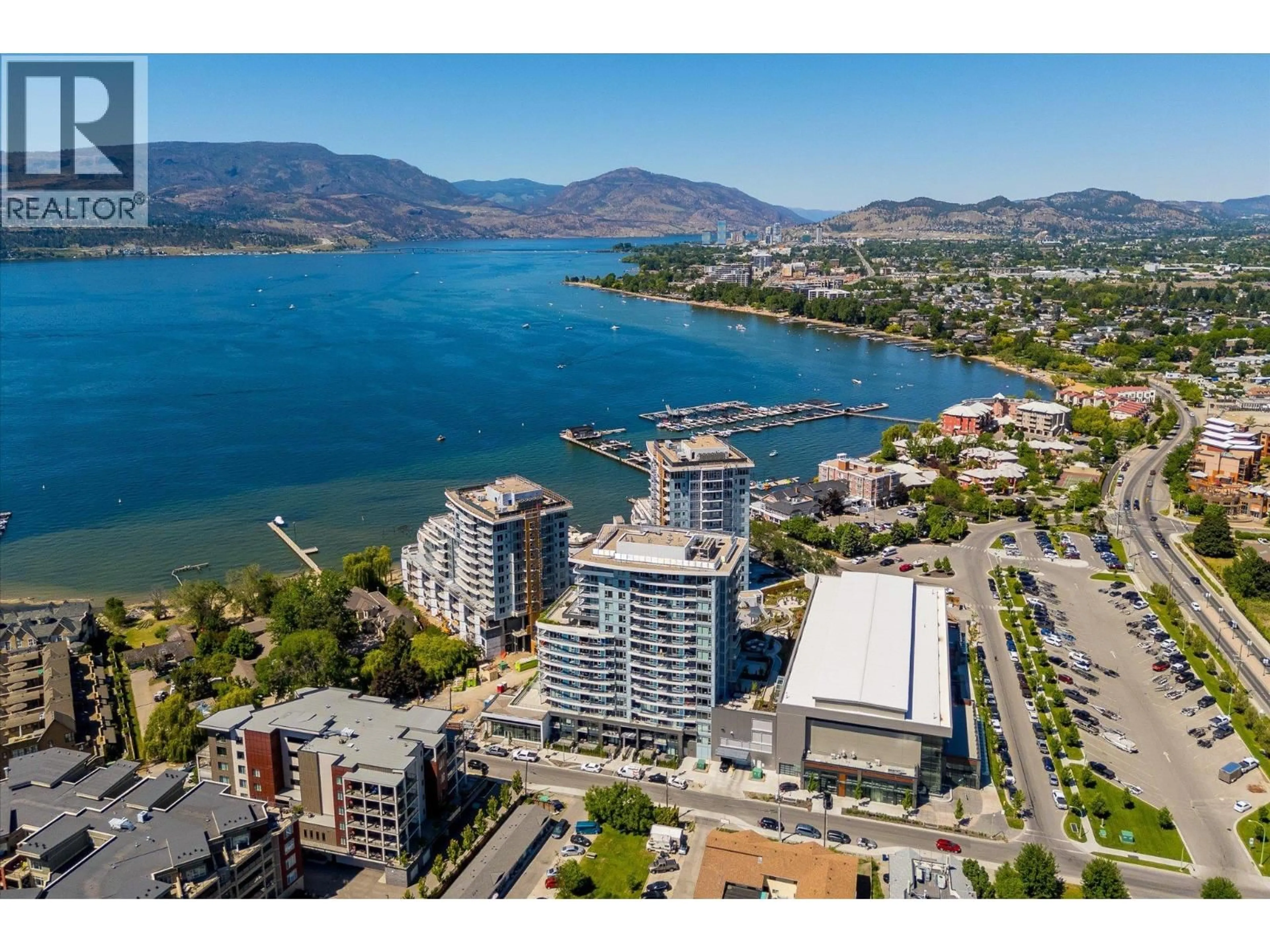 A pic from outside/outdoor area/front of a property/back of a property/a pic from drone, water/lake/river/ocean view for 108 - 3699 CAPOZZI ROAD, Kelowna British Columbia V1W0G3