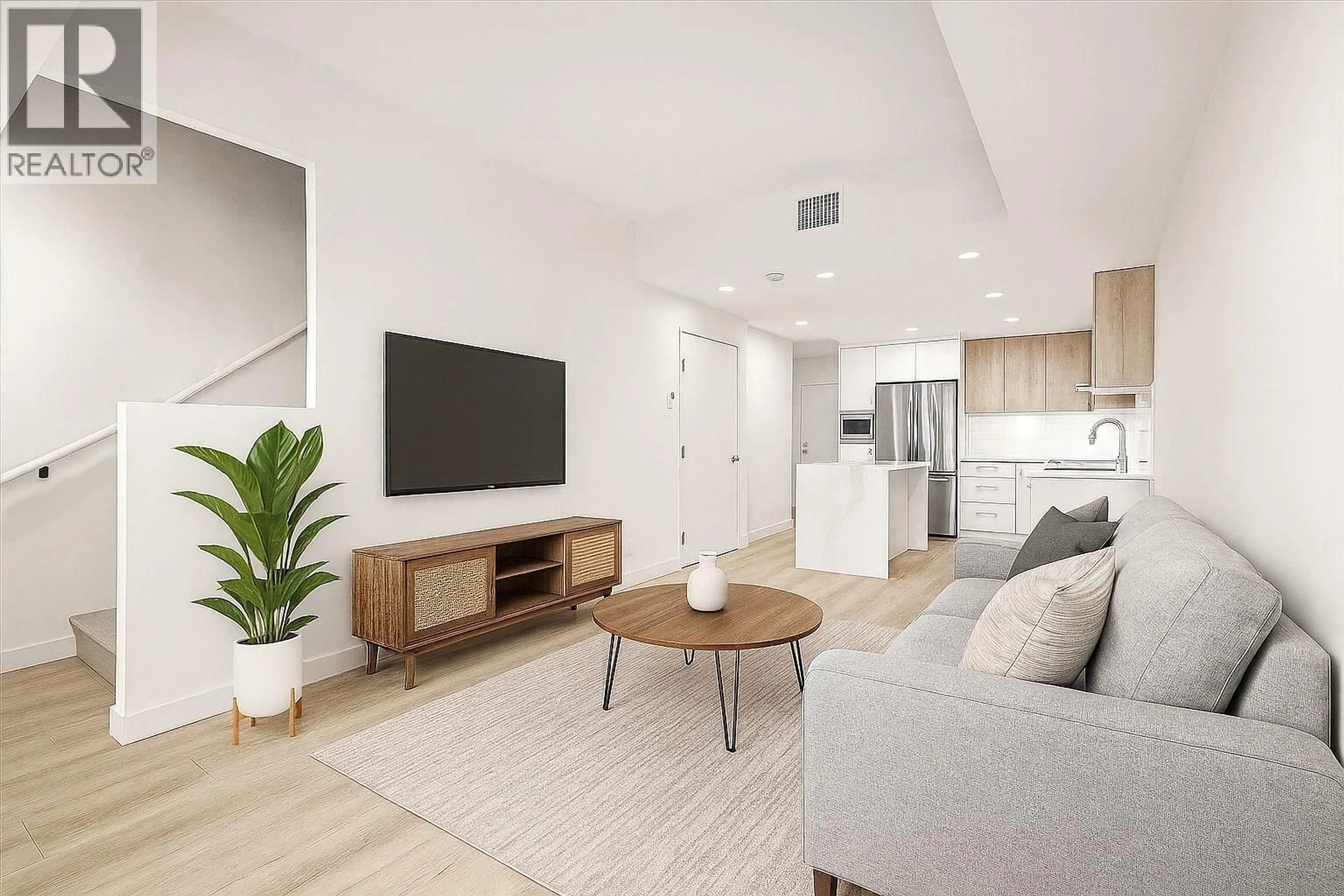 Living room with furniture, unknown for 108 - 3699 CAPOZZI ROAD, Kelowna British Columbia V1W0G3