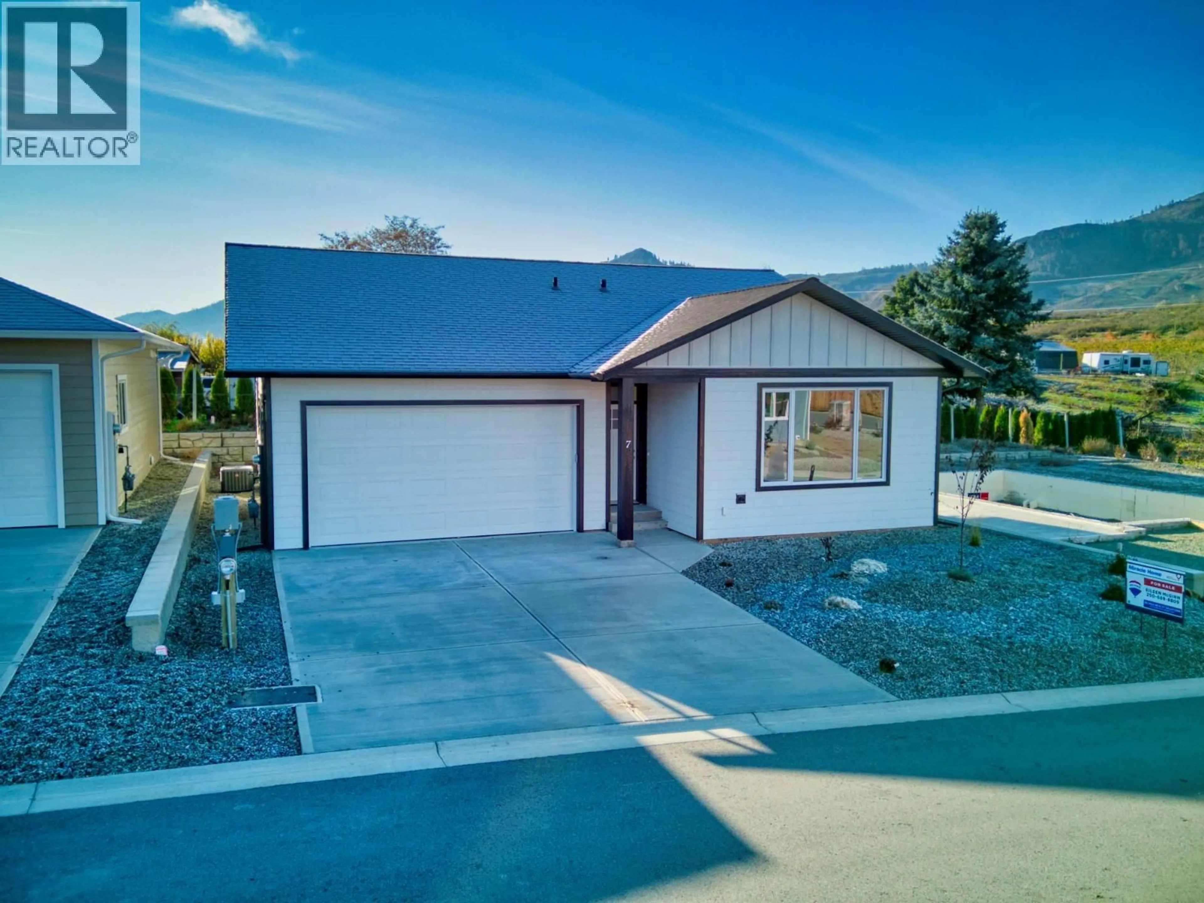 Home with vinyl exterior material, street for 7 WOOD DUCK WAY, Osoyoos British Columbia V0H1V5