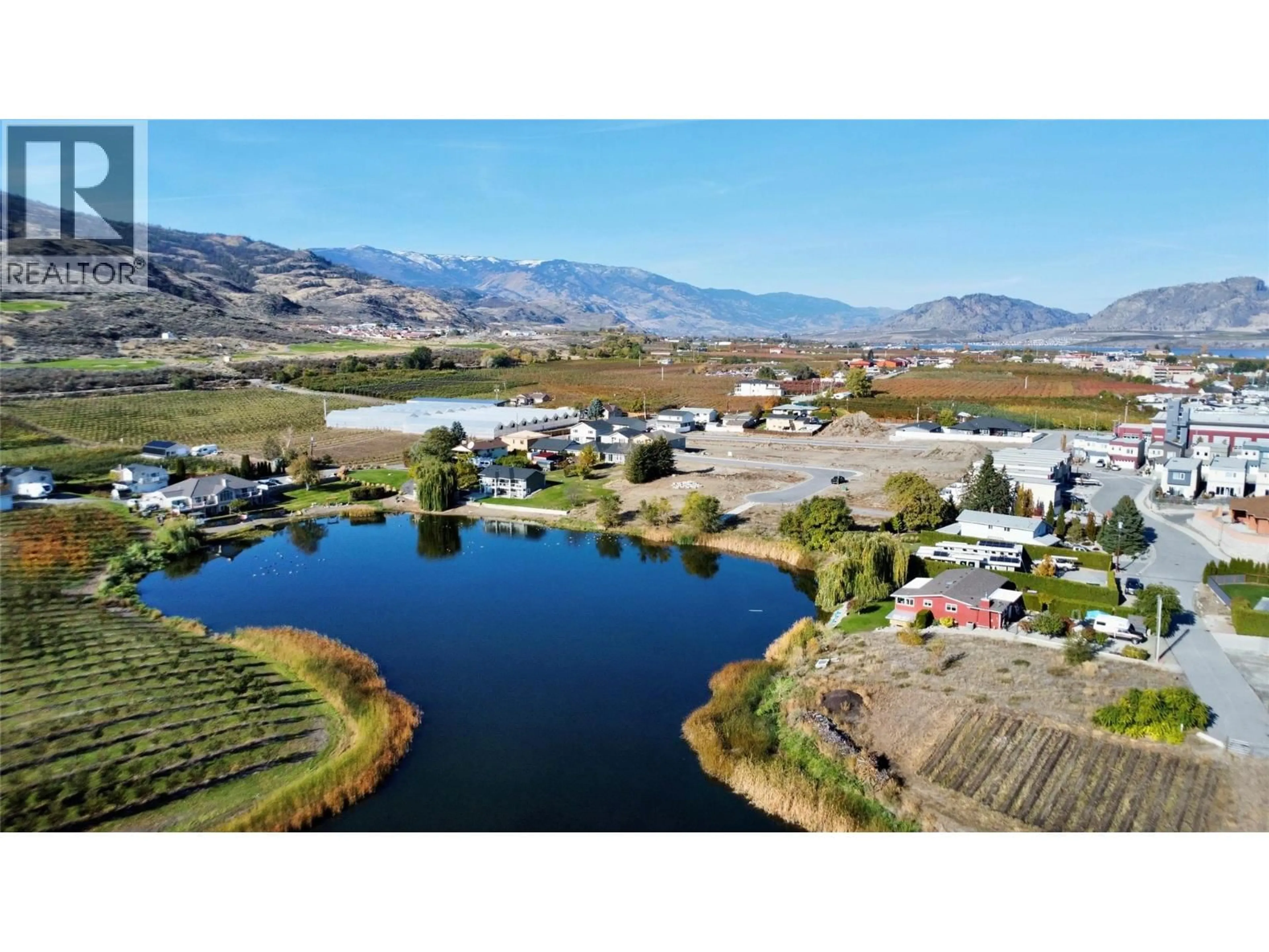 A pic from outside/outdoor area/front of a property/back of a property/a pic from drone, water/lake/river/ocean view for 7 WOOD DUCK WAY, Osoyoos British Columbia V0H1V5