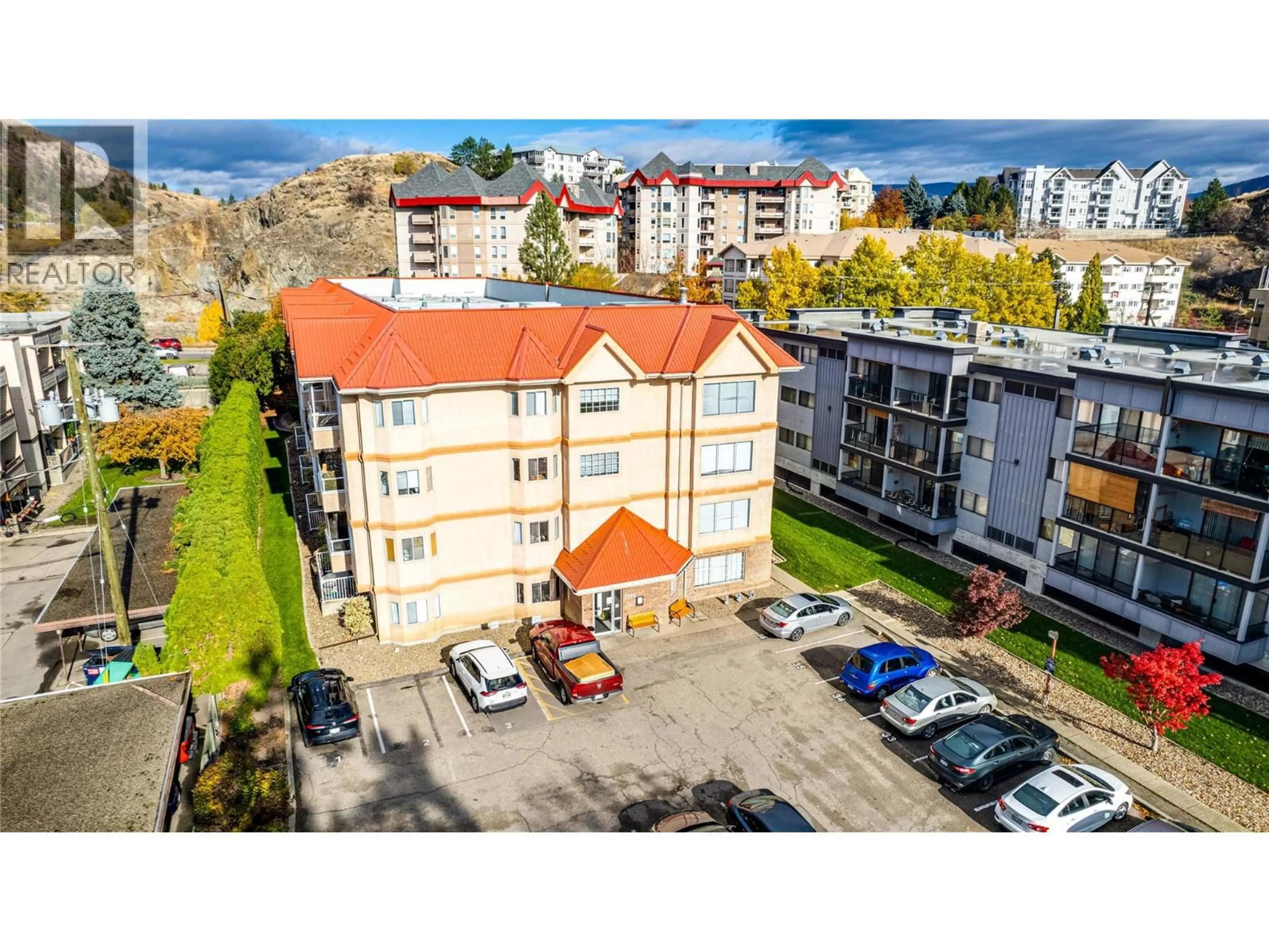 A pic from outside/outdoor area/front of a property/back of a property/a pic from drone, city buildings view from balcony for 208 - 3609 30 AVENUE, Vernon British Columbia V1T2E6