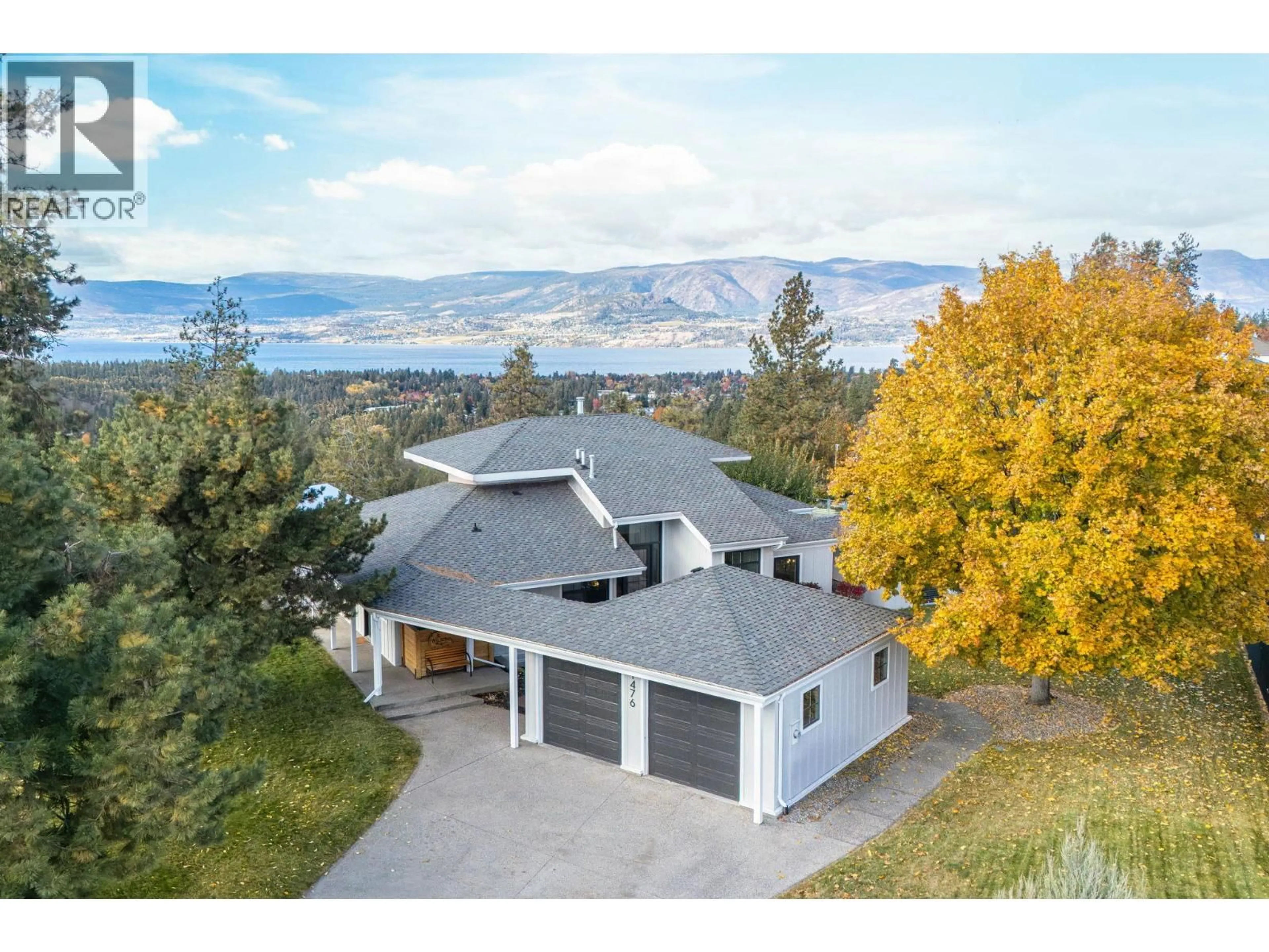 A pic from outside/outdoor area/front of a property/back of a property/a pic from drone, mountain view for 1476 WESTRIDGE COURT, Kelowna British Columbia V1W3B5
