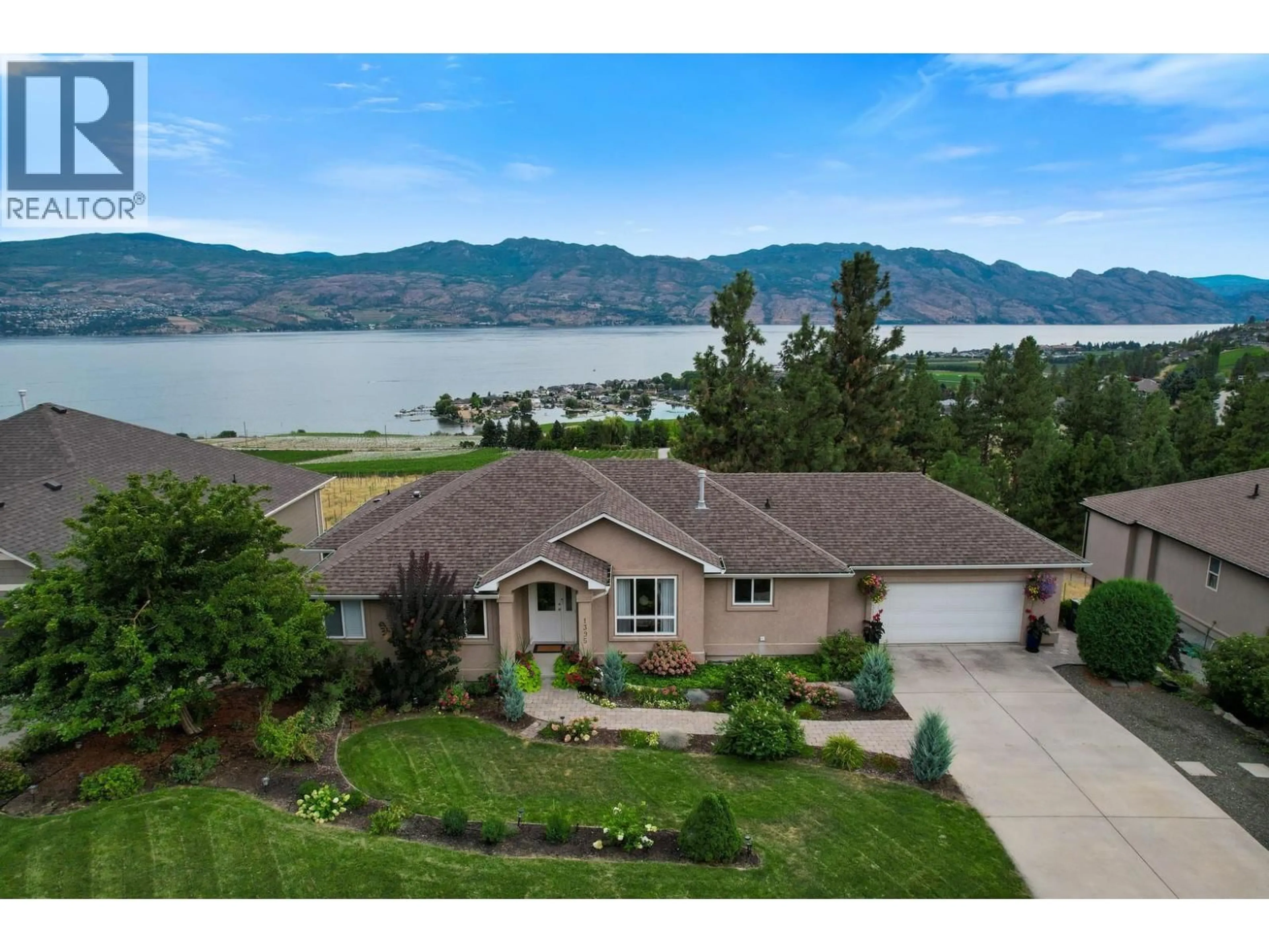 A pic from outside/outdoor area/front of a property/back of a property/a pic from drone, water/lake/river/ocean view for 1395 GREGORY ROAD, West Kelowna British Columbia V1Z3P2