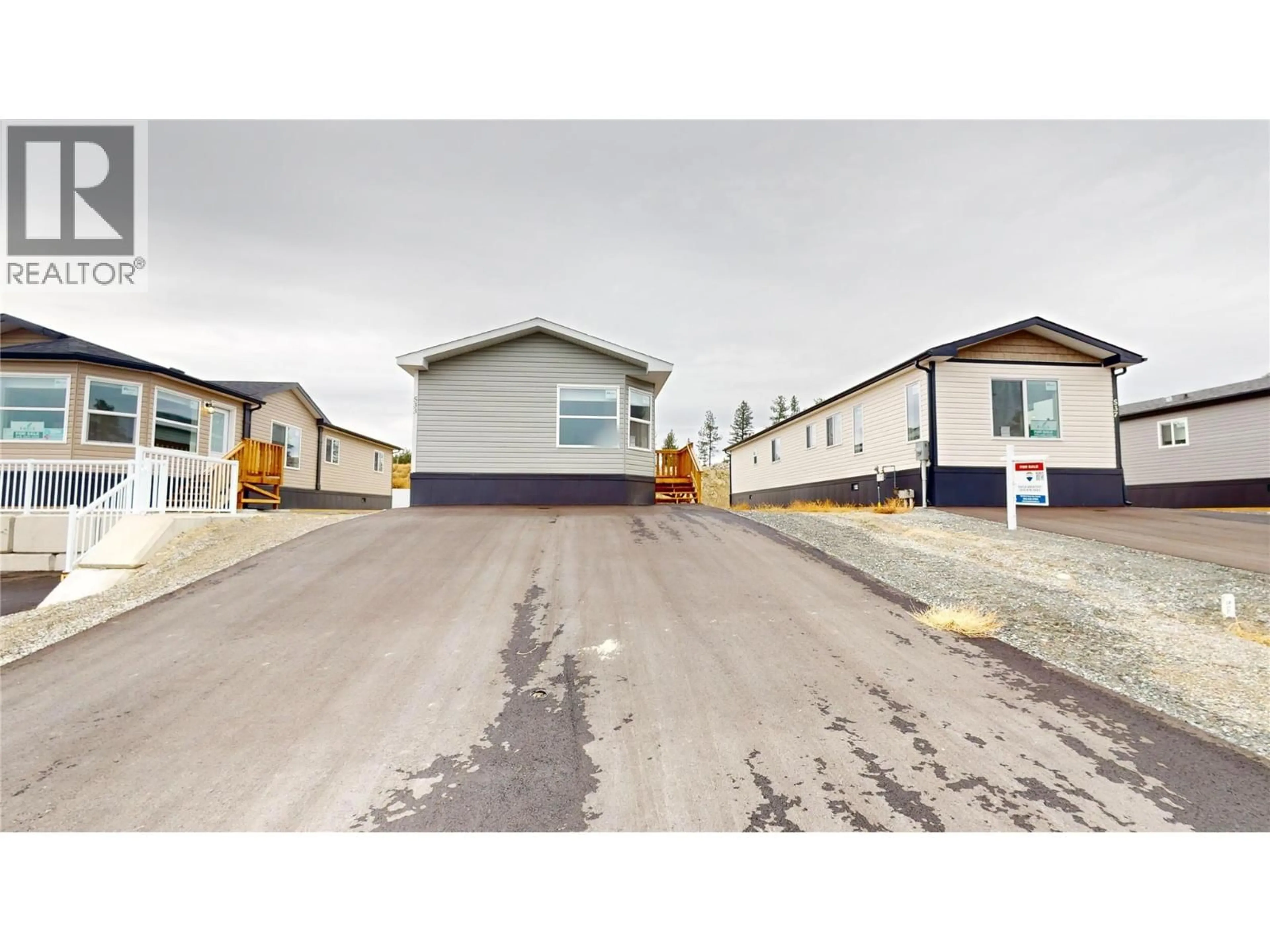 A pic from outside/outdoor area/front of a property/back of a property/a pic from drone, street for 533 STEEPLEVIEW AVENUE NORTHWEST, Cranbrook British Columbia V1C5L3