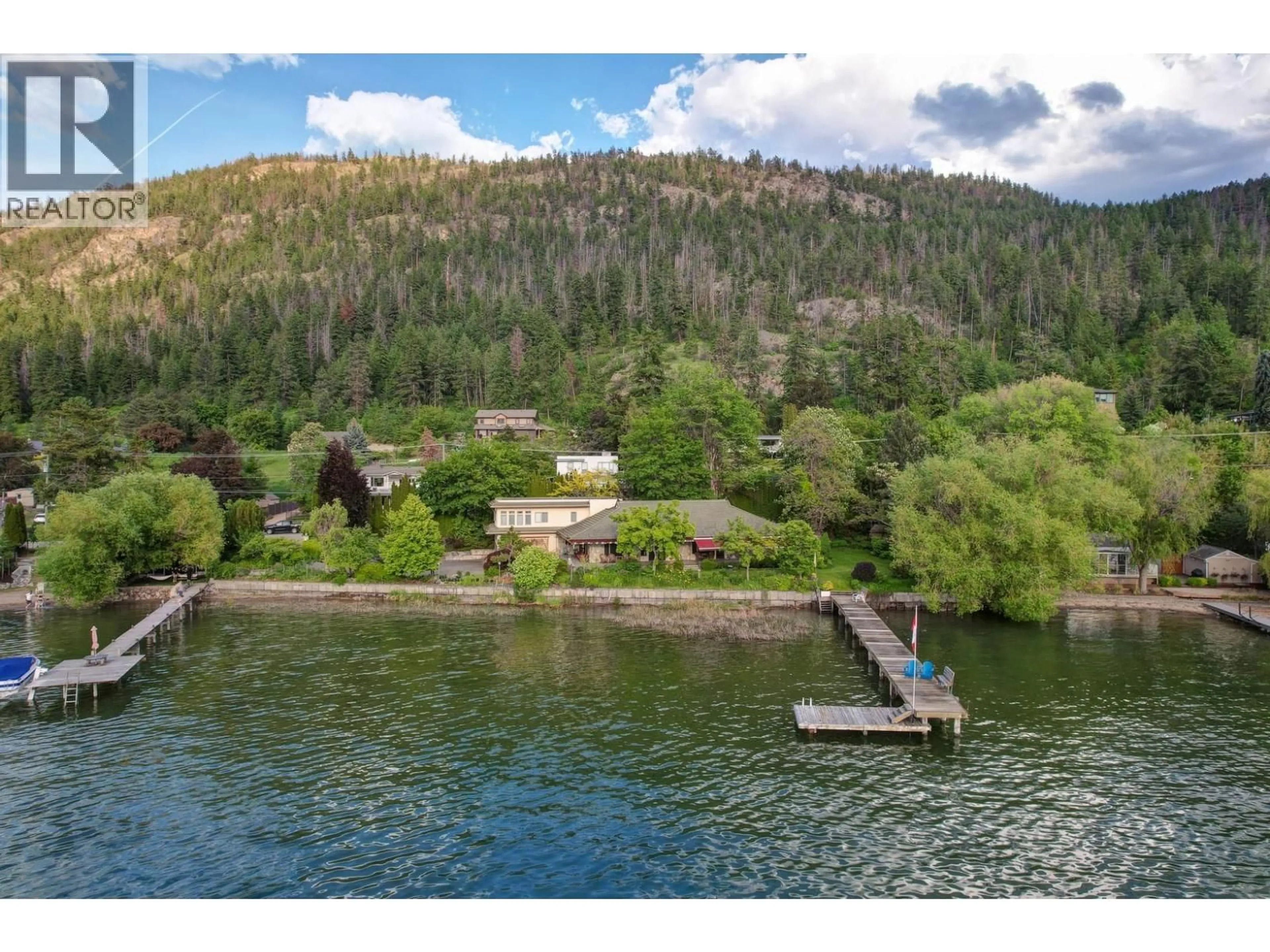 A pic from outside/outdoor area/front of a property/back of a property/a pic from drone, water/lake/river/ocean view for 8809 OKANAGAN LANDING ROAD, Vernon British Columbia V1H1J9