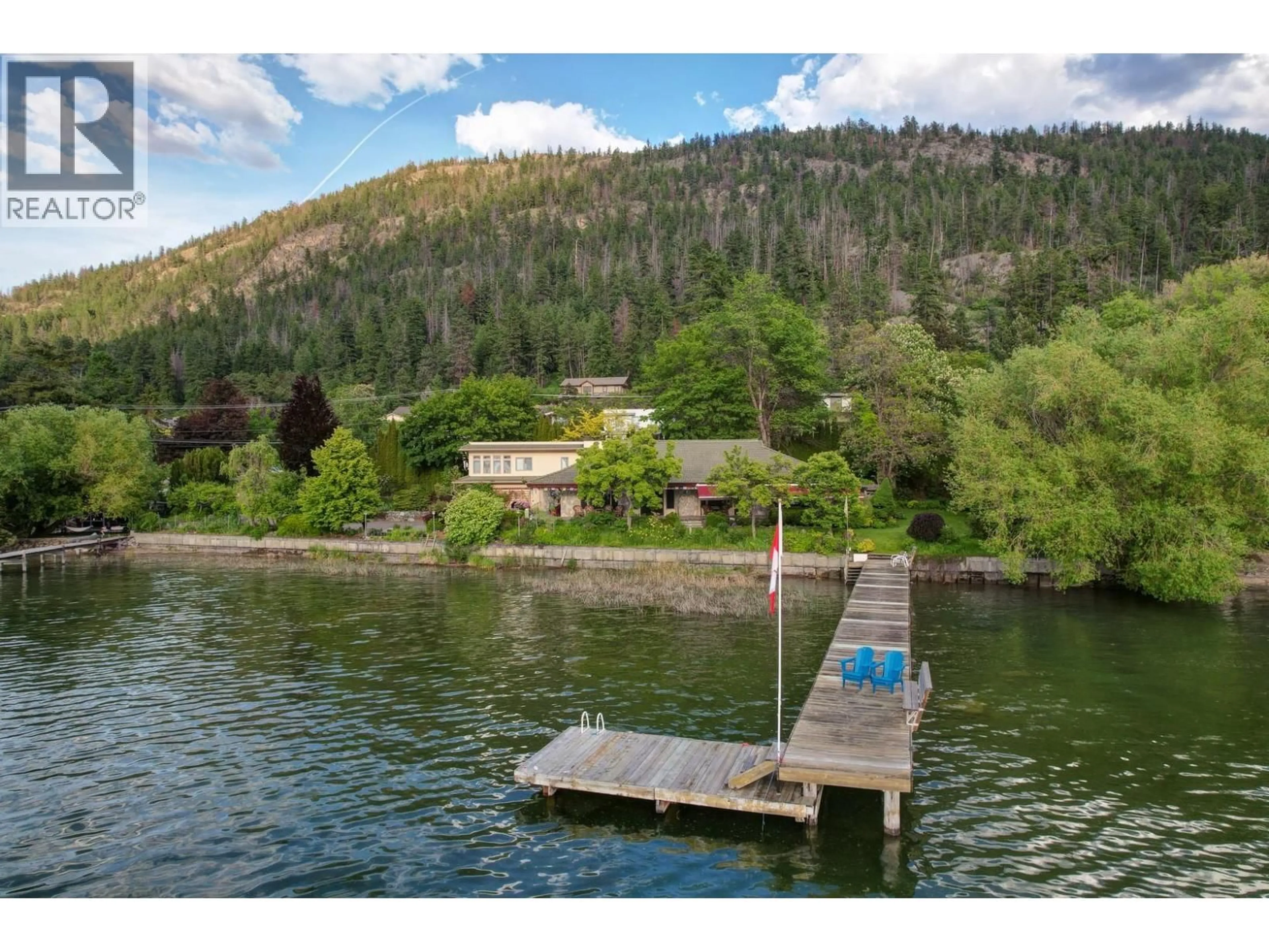 A pic from outside/outdoor area/front of a property/back of a property/a pic from drone, water/lake/river/ocean view for 8809 OKANAGAN LANDING ROAD, Vernon British Columbia V1H1J9