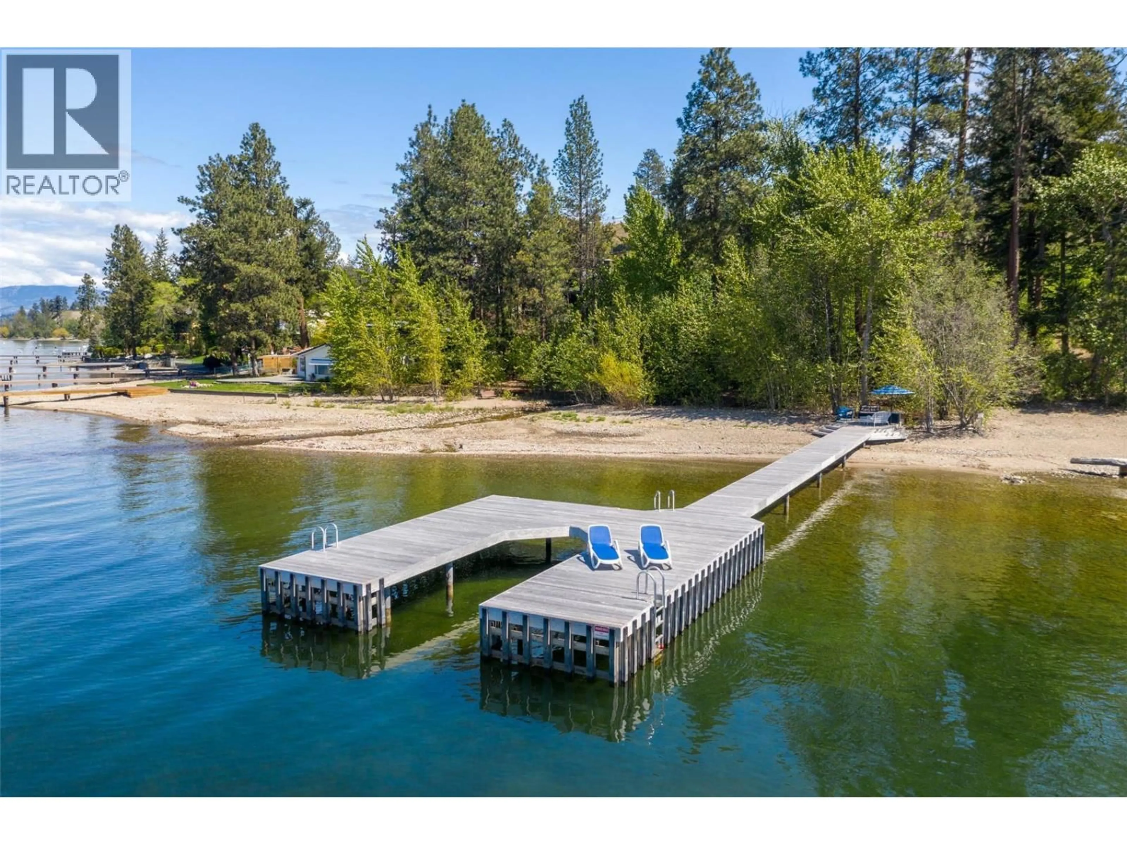 A pic from outside/outdoor area/front of a property/back of a property/a pic from drone, water/lake/river/ocean view for 5308 LAKESHORE ROAD, Kelowna British Columbia V1W4J3