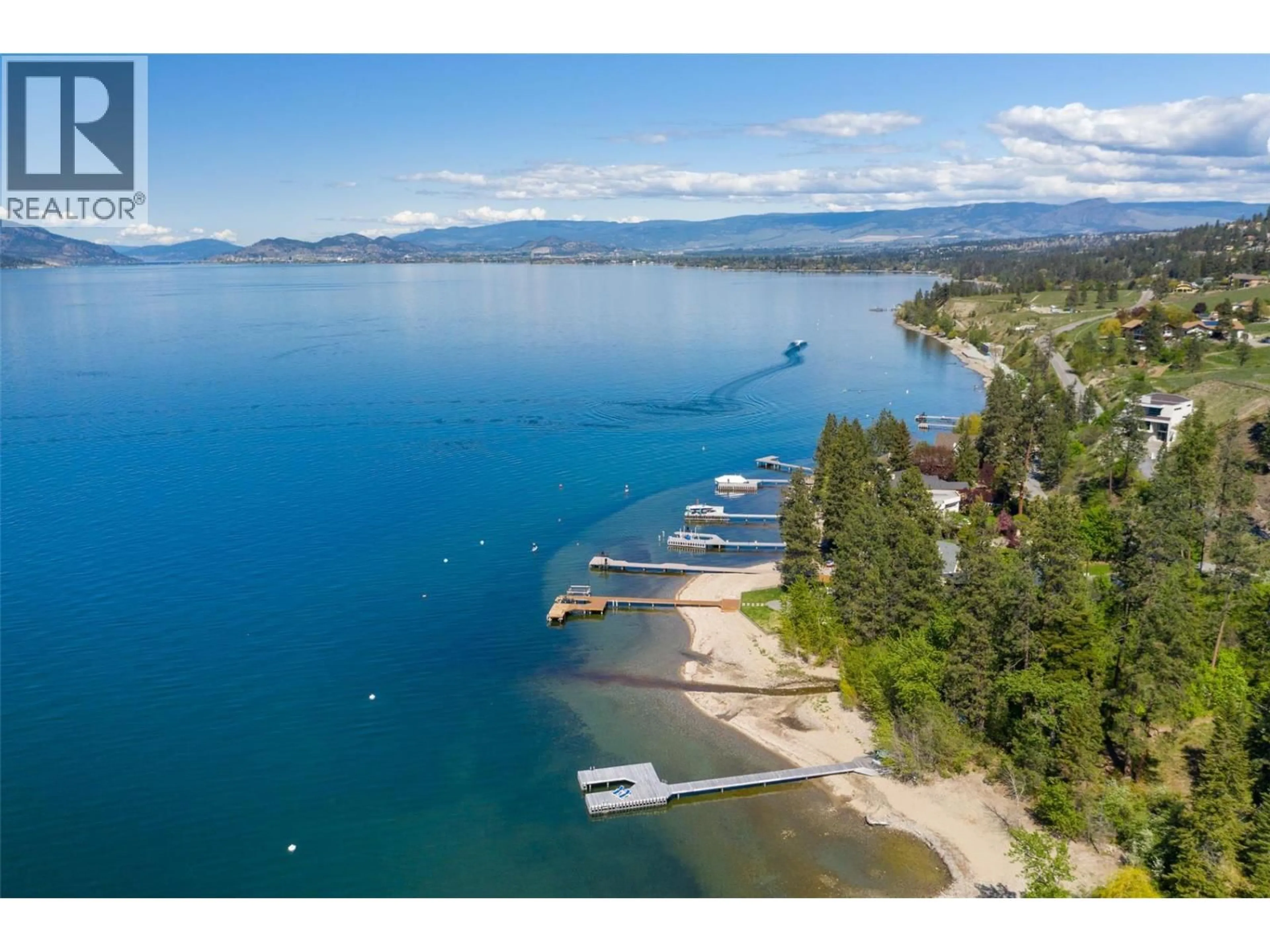 A pic from outside/outdoor area/front of a property/back of a property/a pic from drone, water/lake/river/ocean view for 5308 LAKESHORE ROAD, Kelowna British Columbia V1W4J3