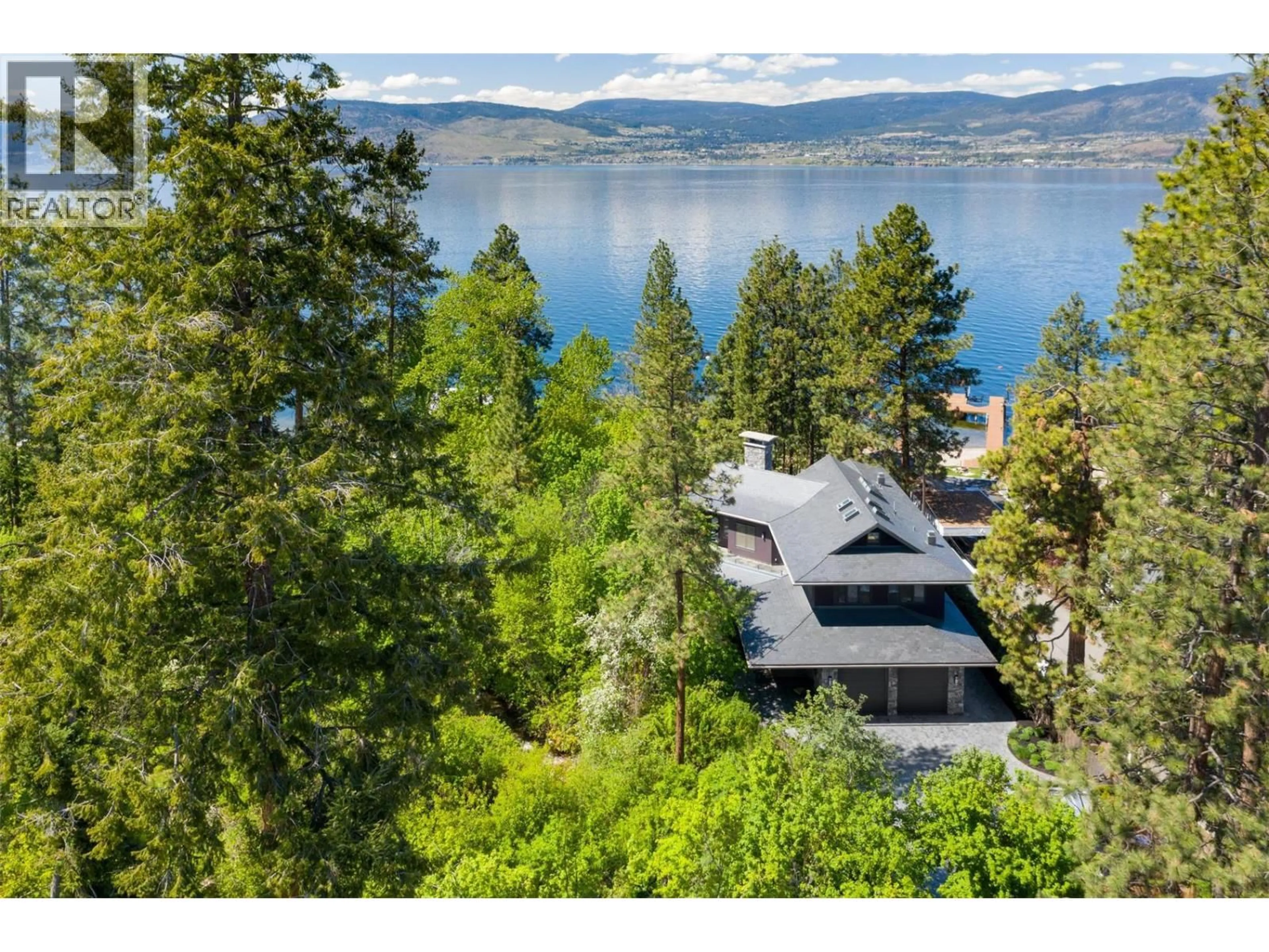 A pic from outside/outdoor area/front of a property/back of a property/a pic from drone, water/lake/river/ocean view for 5308 LAKESHORE ROAD, Kelowna British Columbia V1W4J3