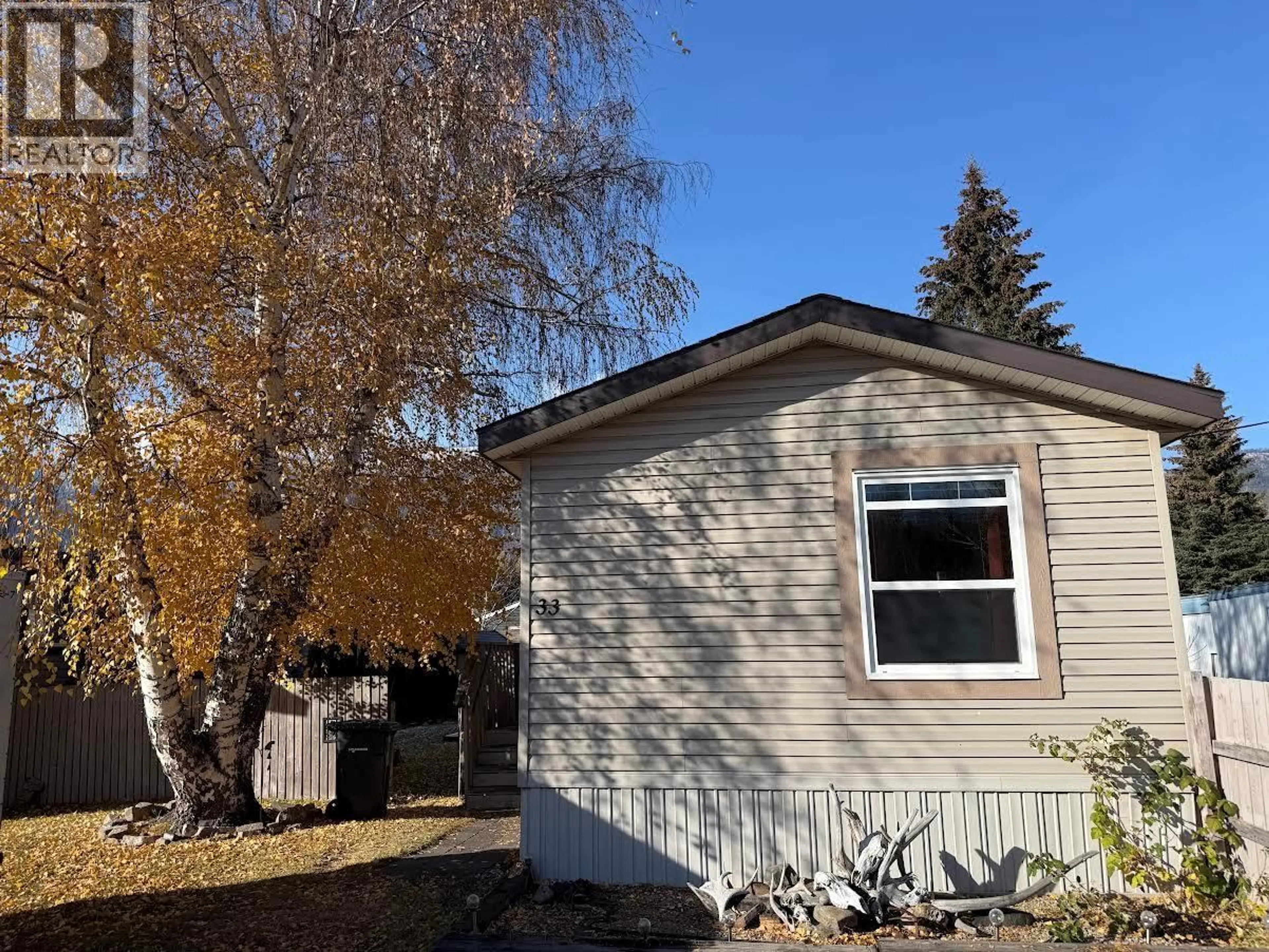 Home with vinyl exterior material, street for 33 - 100 ASPEN DRIVE DRIVE, Sparwood British Columbia V0B2G1