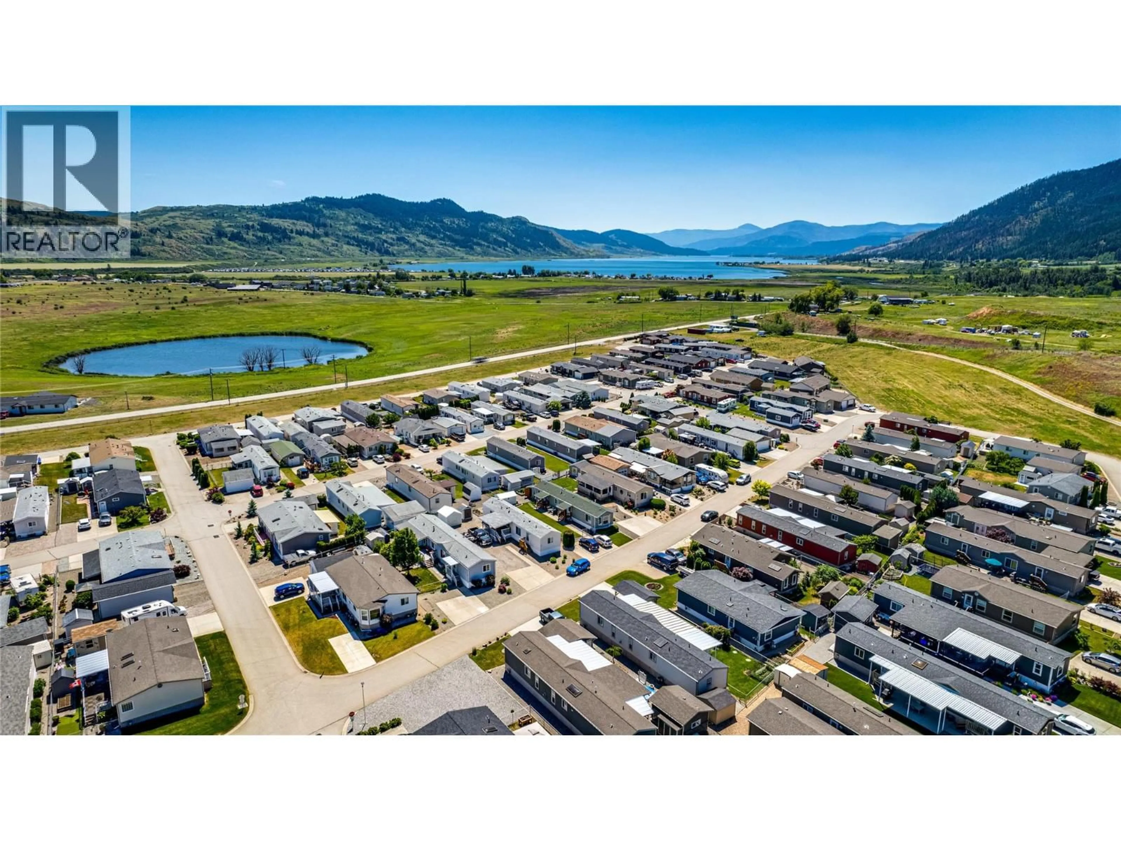 A pic from outside/outdoor area/front of a property/back of a property/a pic from drone, mountain view for 81 - 12560 WESTSIDE ROAD, Vernon British Columbia V1H1S9