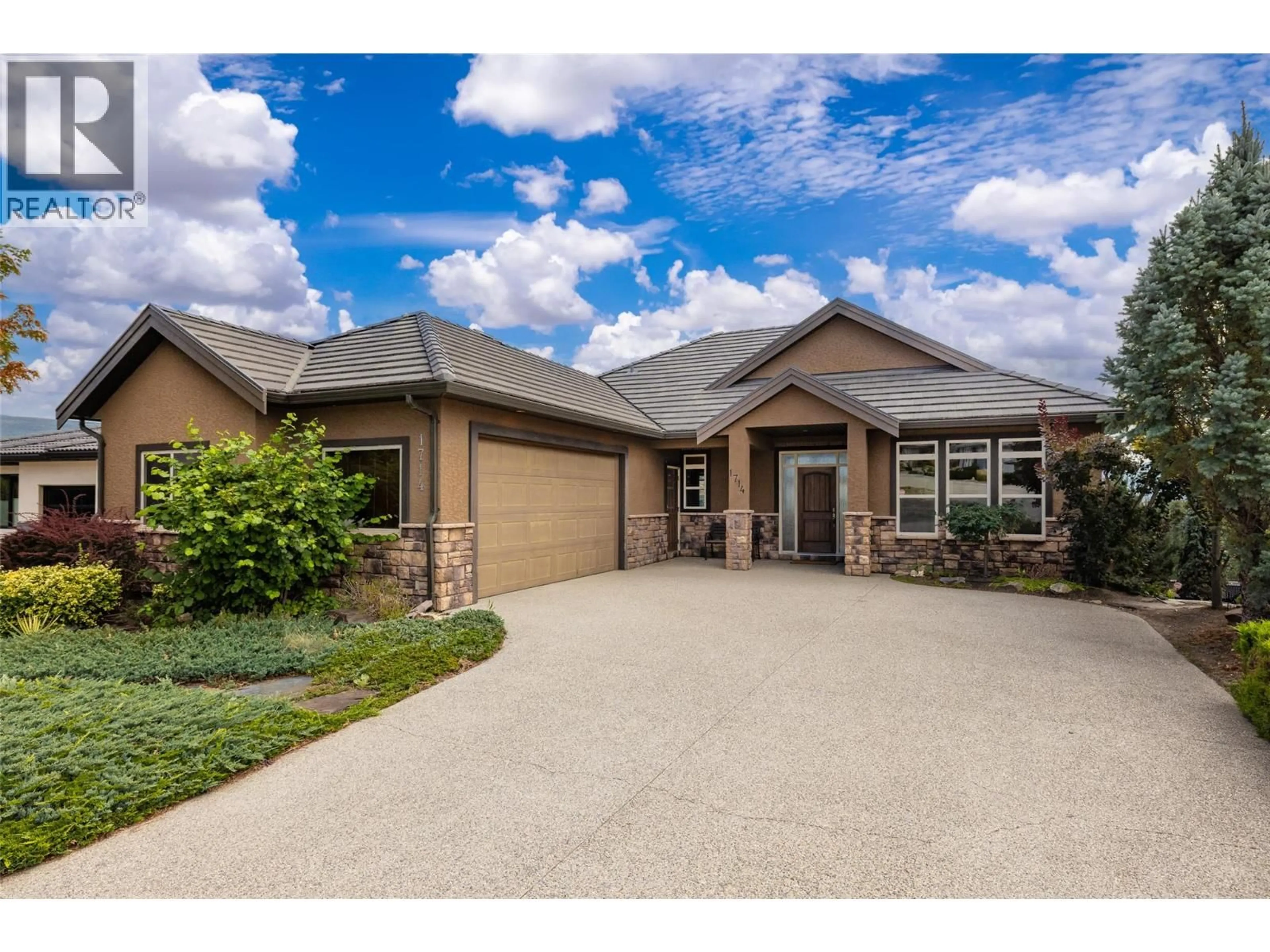 Home with brick exterior material, street for 1714 CAPISTRANO PEAKS CRESCENT, Kelowna British Columbia V1V2Z3