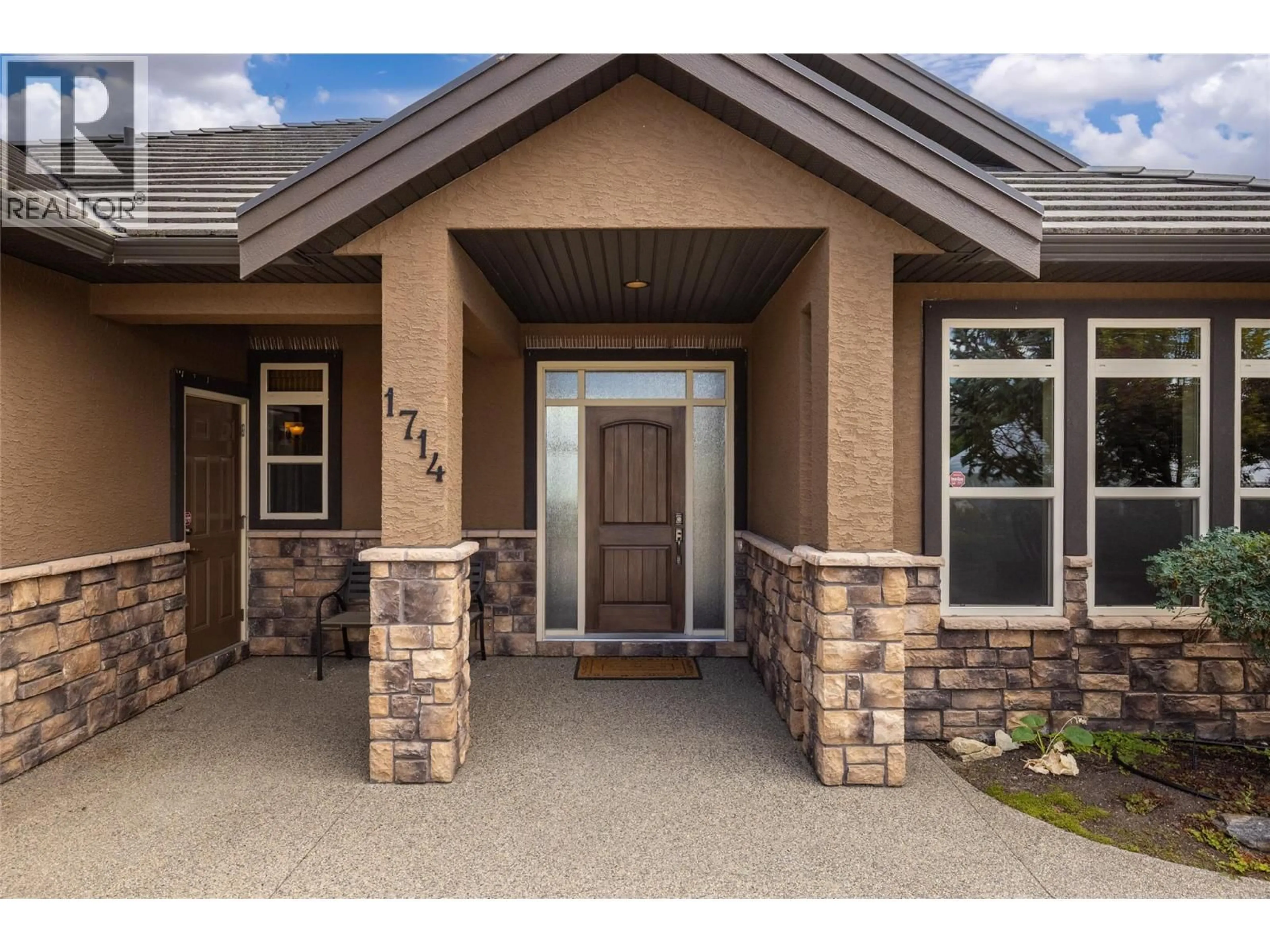 Home with brick exterior material, street for 1714 CAPISTRANO PEAKS CRESCENT, Kelowna British Columbia V1V2Z3