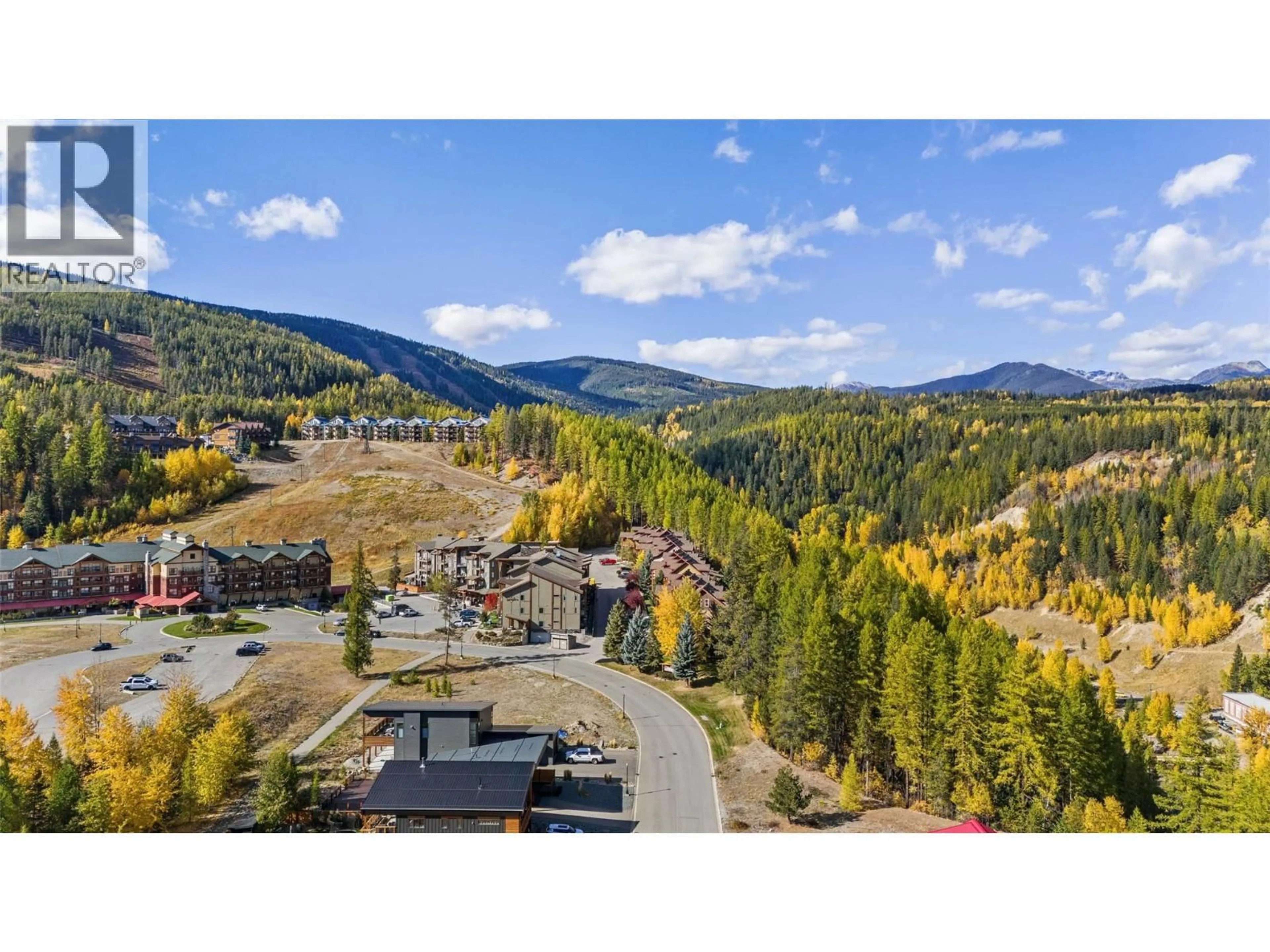 A pic from outside/outdoor area/front of a property/back of a property/a pic from drone, mountain view for 148 STEMWINDER DRIVE, Kimberley British Columbia V1A2Y5