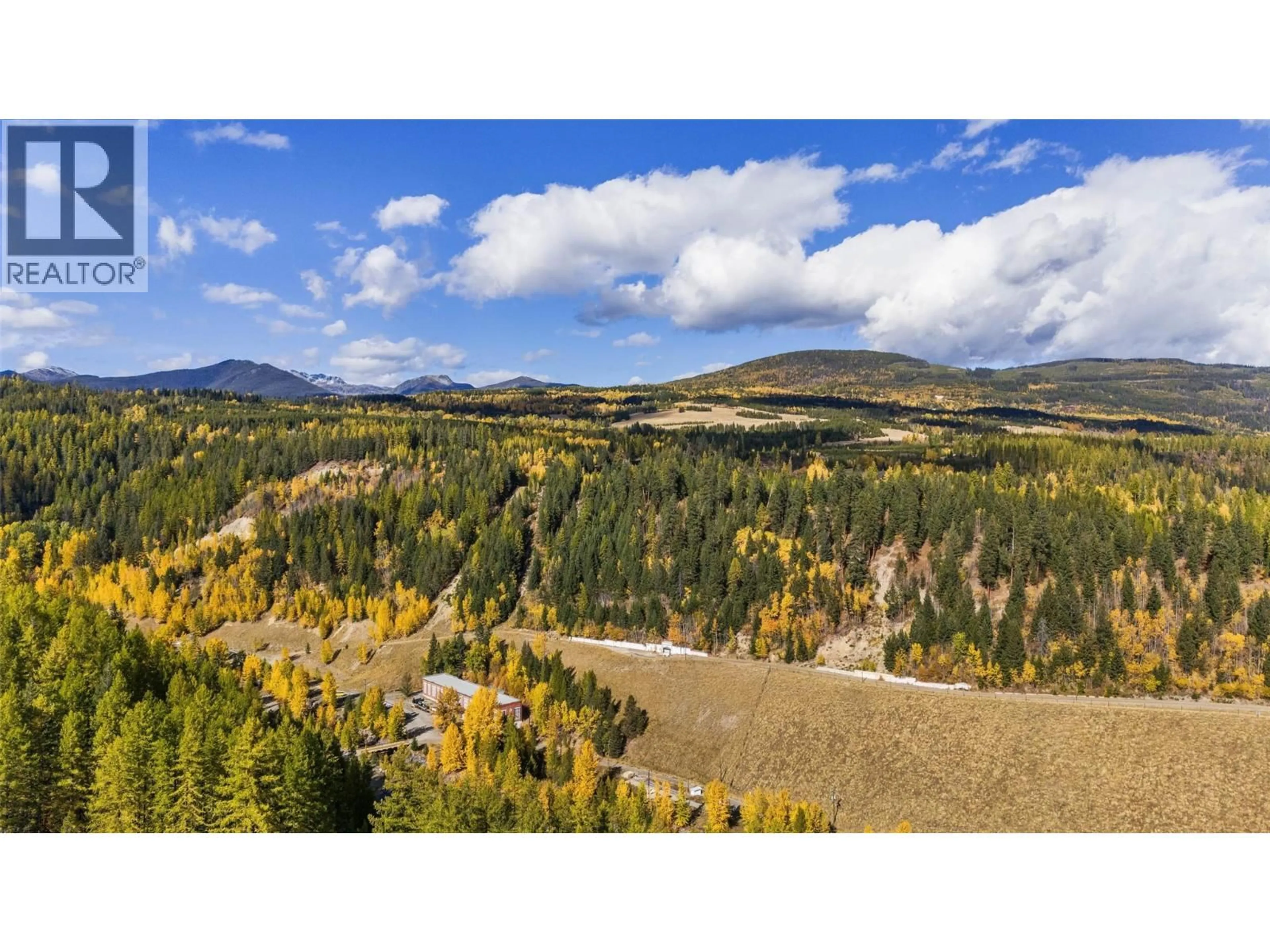 A pic from outside/outdoor area/front of a property/back of a property/a pic from drone, forest/trees view for 148 STEMWINDER DRIVE, Kimberley British Columbia V1A2Y5
